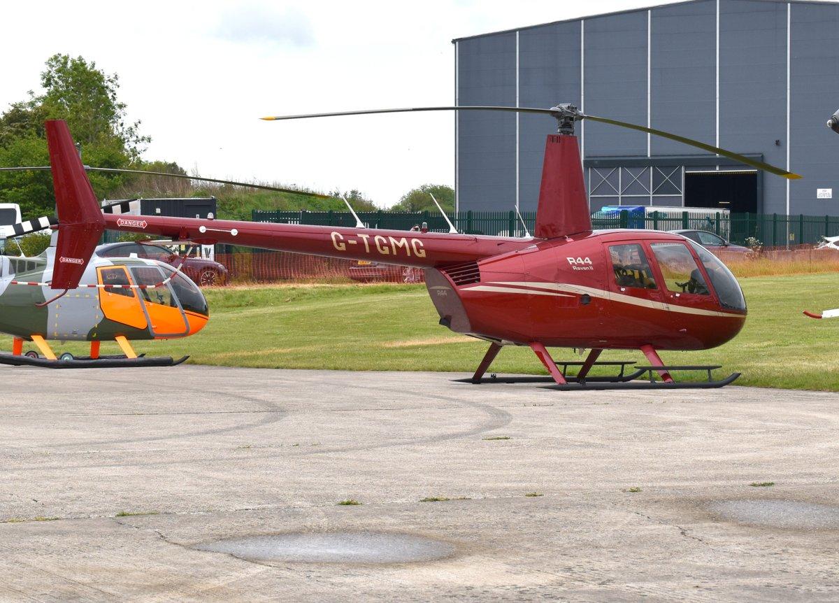 G-TGMG @ EGTB - Robinson R44 Raven II at Wycombe Air Park. - by moxy