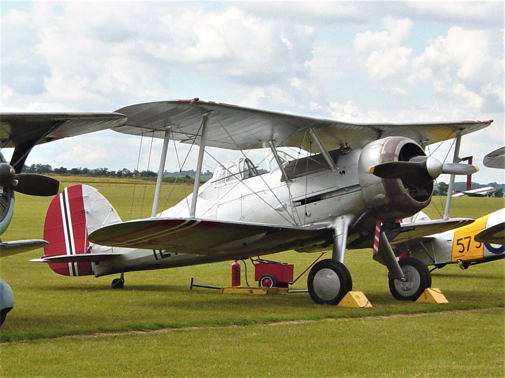 G-AMRK @ EGSU - 427 (G-AMRK) 1937 Gloster Gladiator l RNorwAF Duxford  - by PhilR