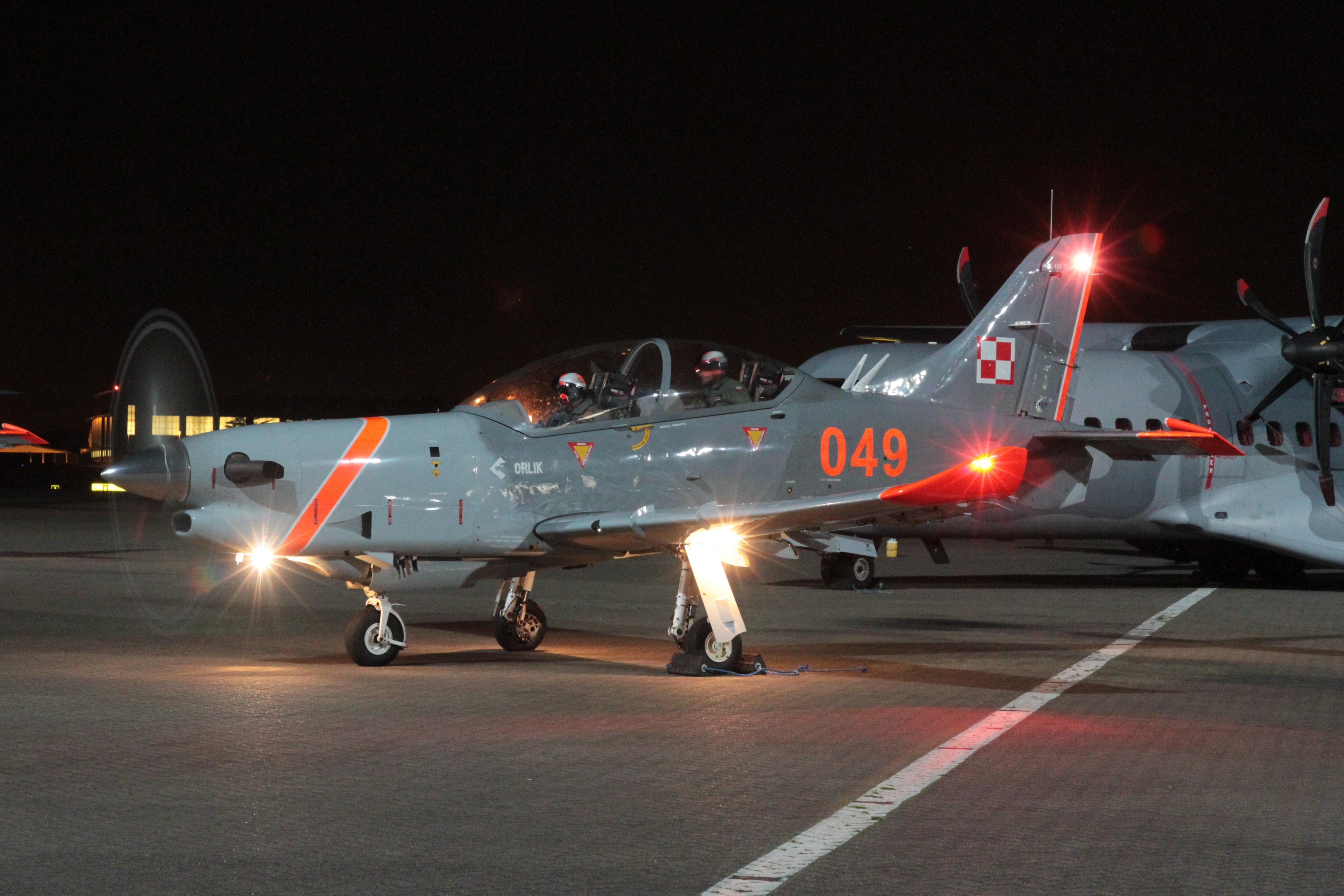 049 @ EGWU - 049 PZL-130 Turbo Orlik Polish AF Northolt Night Shoot 
 - by PhilR