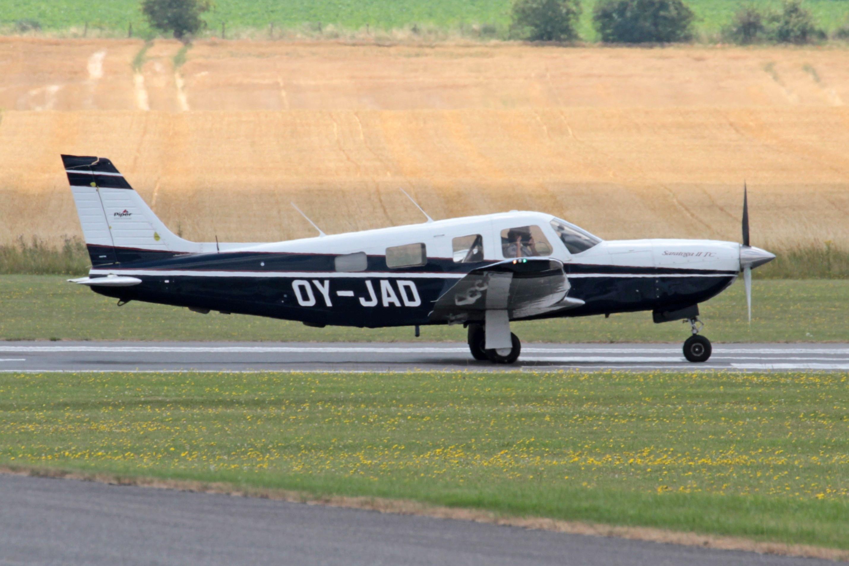 OY-JAD @ EGSU - OY-JAD Piper Pa-32 Saratoga 2 Flying Legends Duxford
 - by PhilR