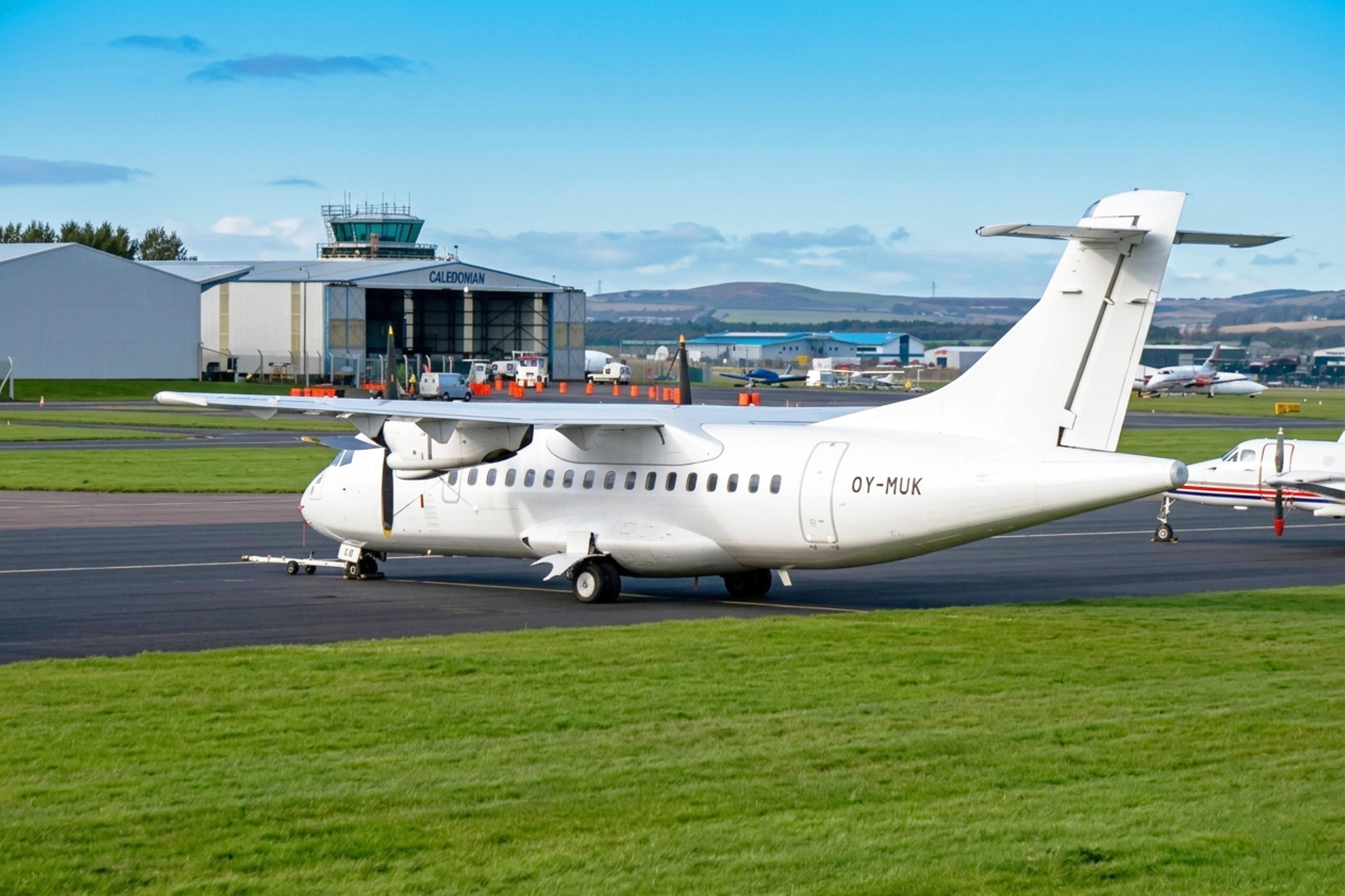 OY-MUK @ EGPD - OY-MUK 1990 ATR42-300 Danish Air Transport ABZ
 - by PhilR