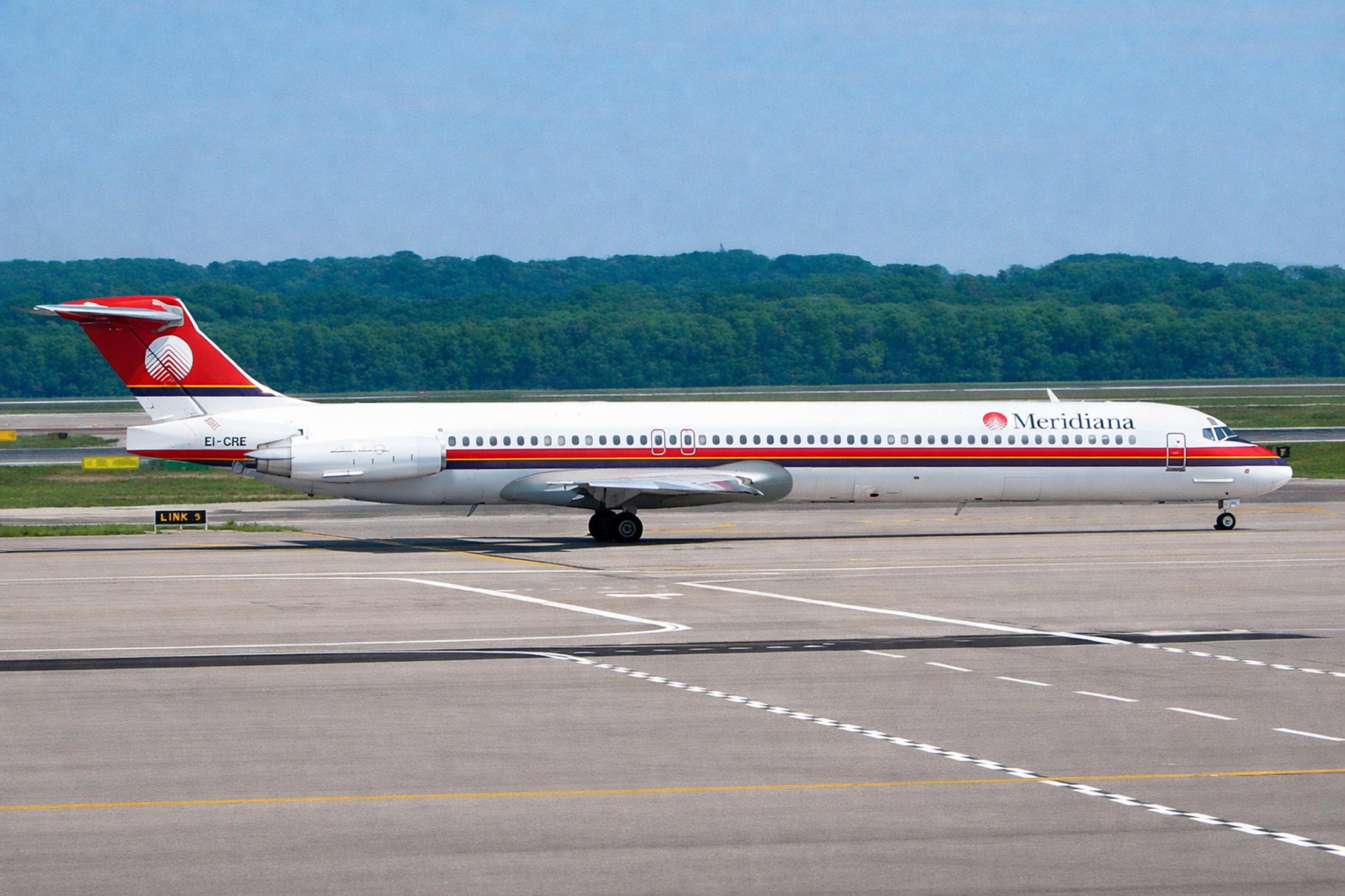 EI-CRE @ LIMC - EI-CRE 1989 MD83 Meridiana MXP
 - by PhilR