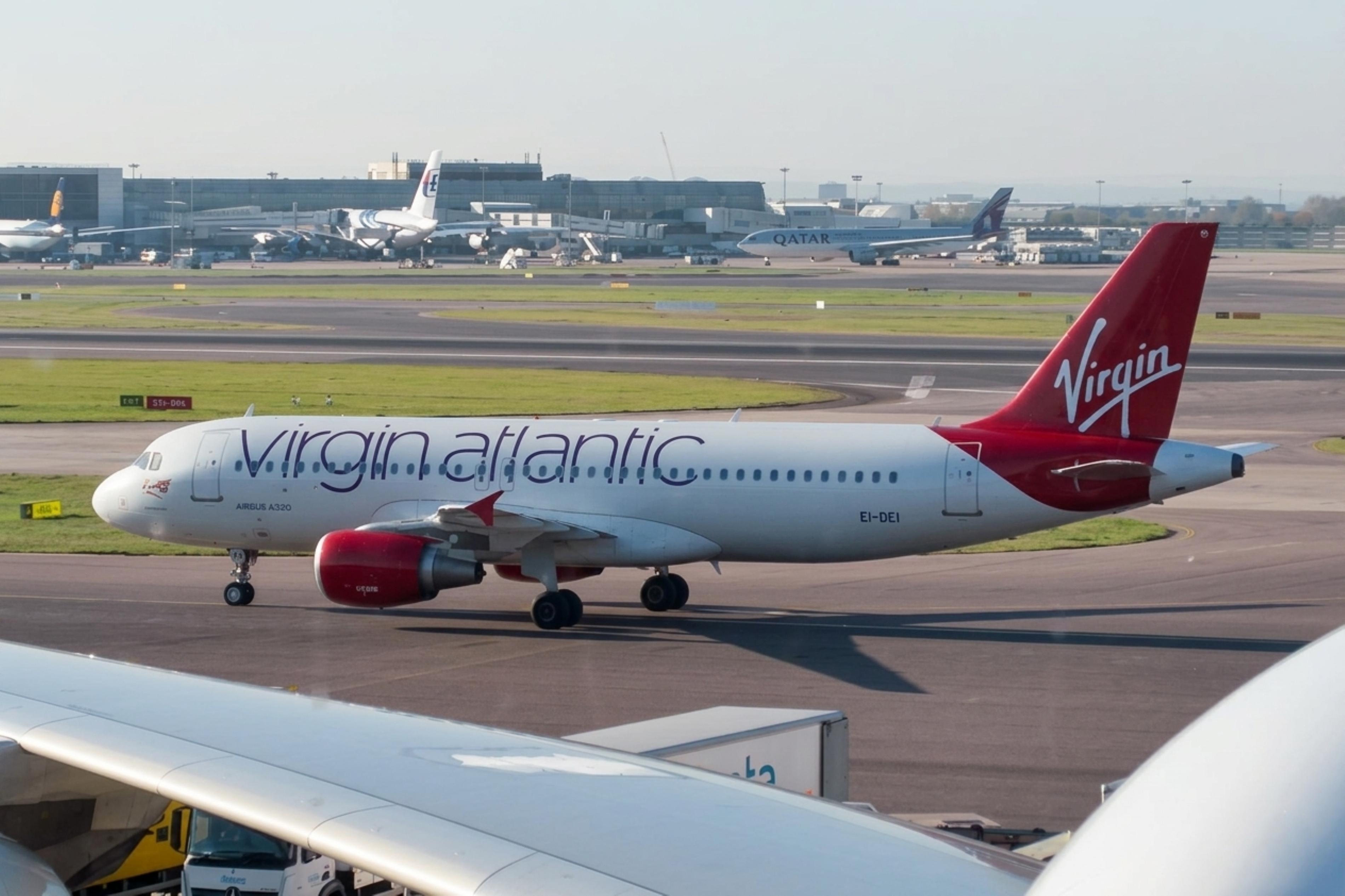 EI-DEI @ EGLL - EI-DEI 2005 A320-200 Aer Lingus- Virgin Atlantic LHR 
 - by PhilR