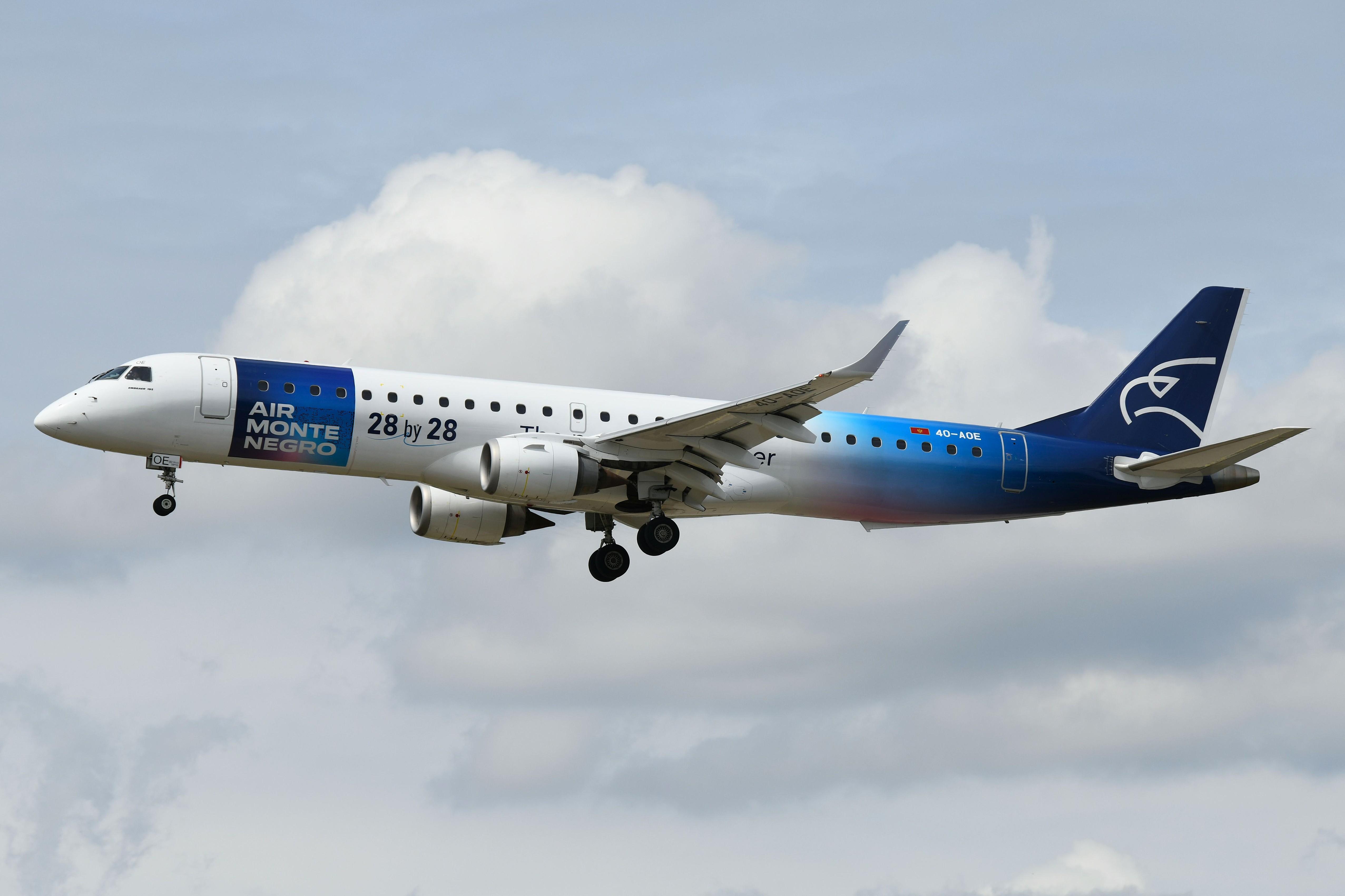 40-AOE @ EDDF - Air Montenegro ERJ195 landing - by FerryPNL