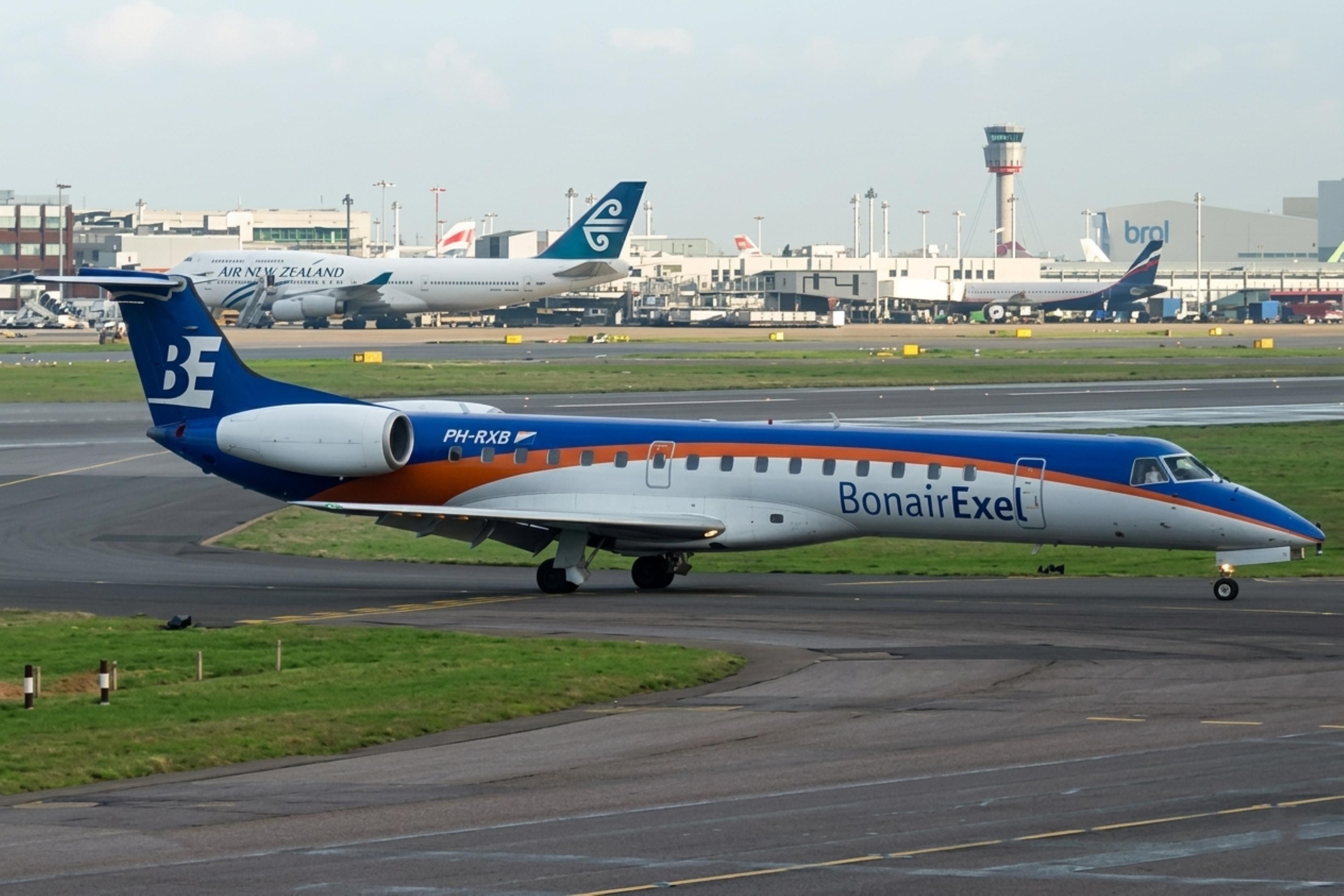 PH-RXB @ EGLL - PH-RXB 2000 ERJ145 Bonair EXEL LHR  - by PhilR
