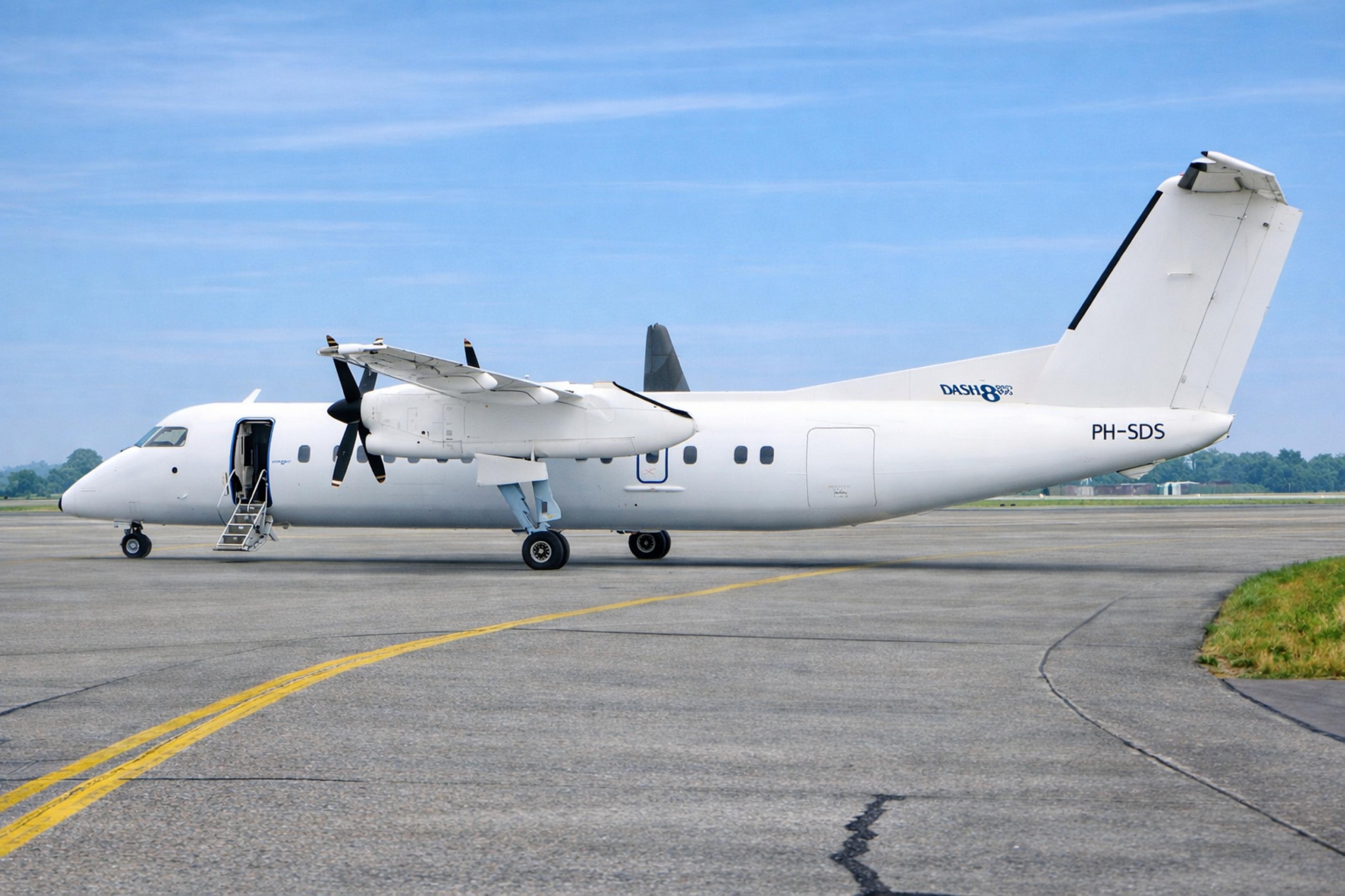 PH-SDS @ EGVA - PH-SDS 1991 DHC-8-300 Schreiner Airways IAT  - by PhilR