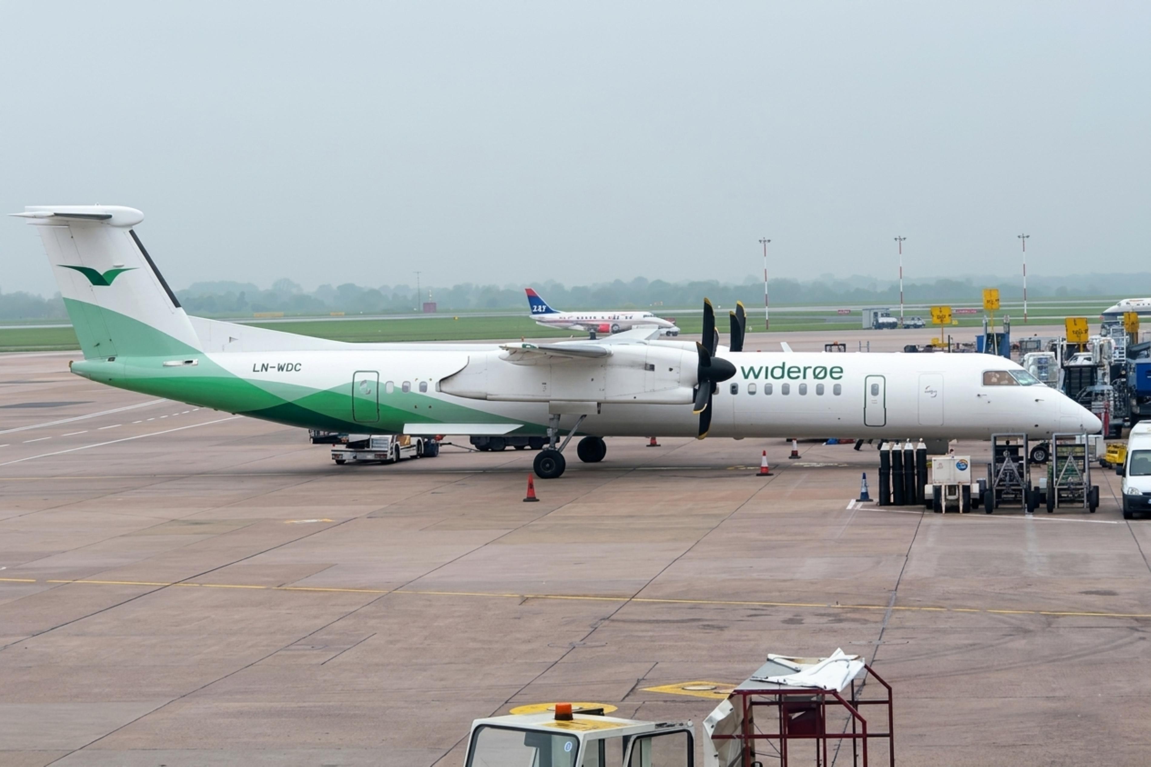 LN-WDC @ EGCC - LN-WDC 2002 DHC-8-400 Wideroe MAN  - by PhilR