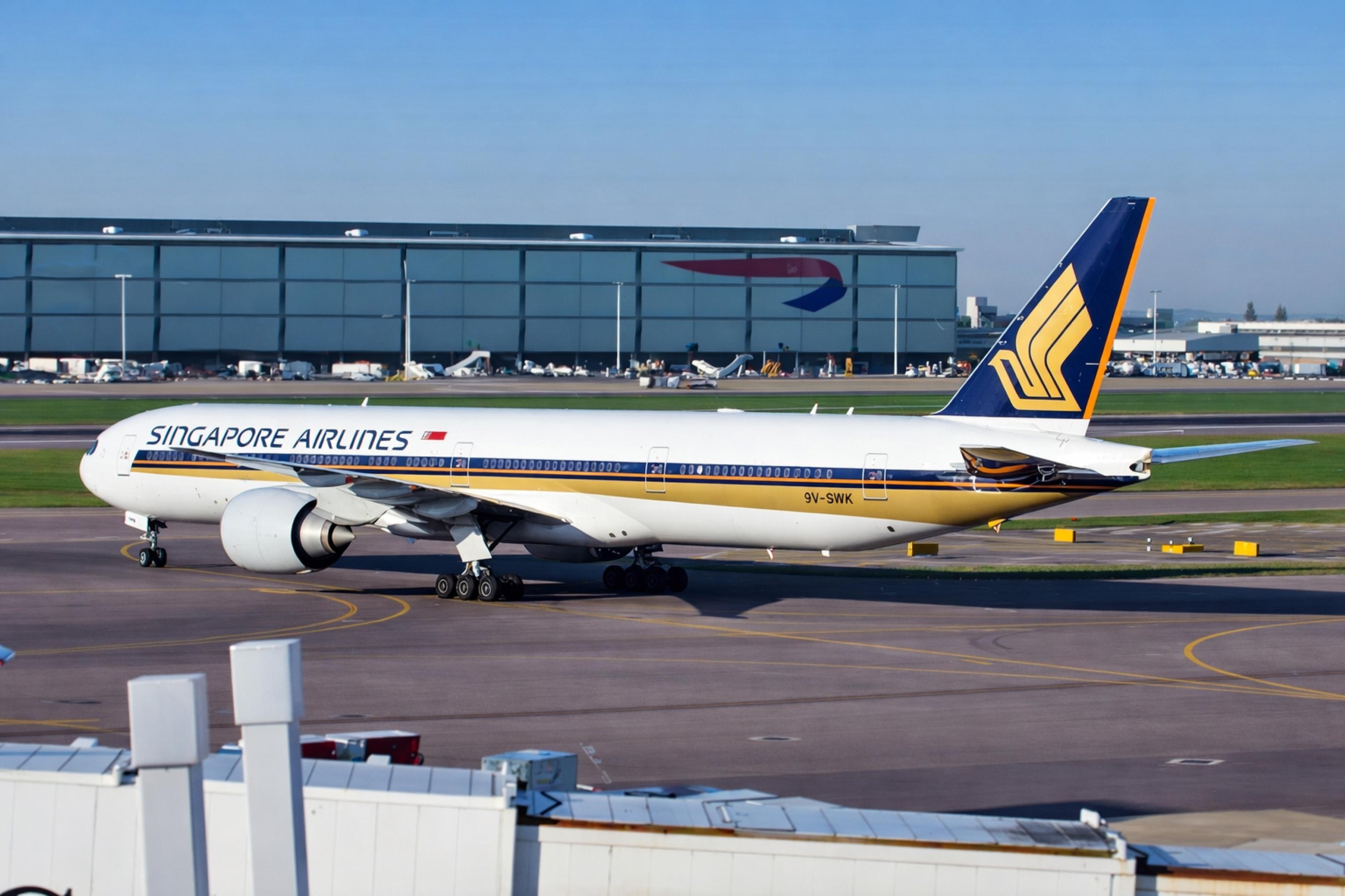 9V-SWK @ EGLL - 9V-SWK 2007 B777-300 SIA LHR  - by PhilR