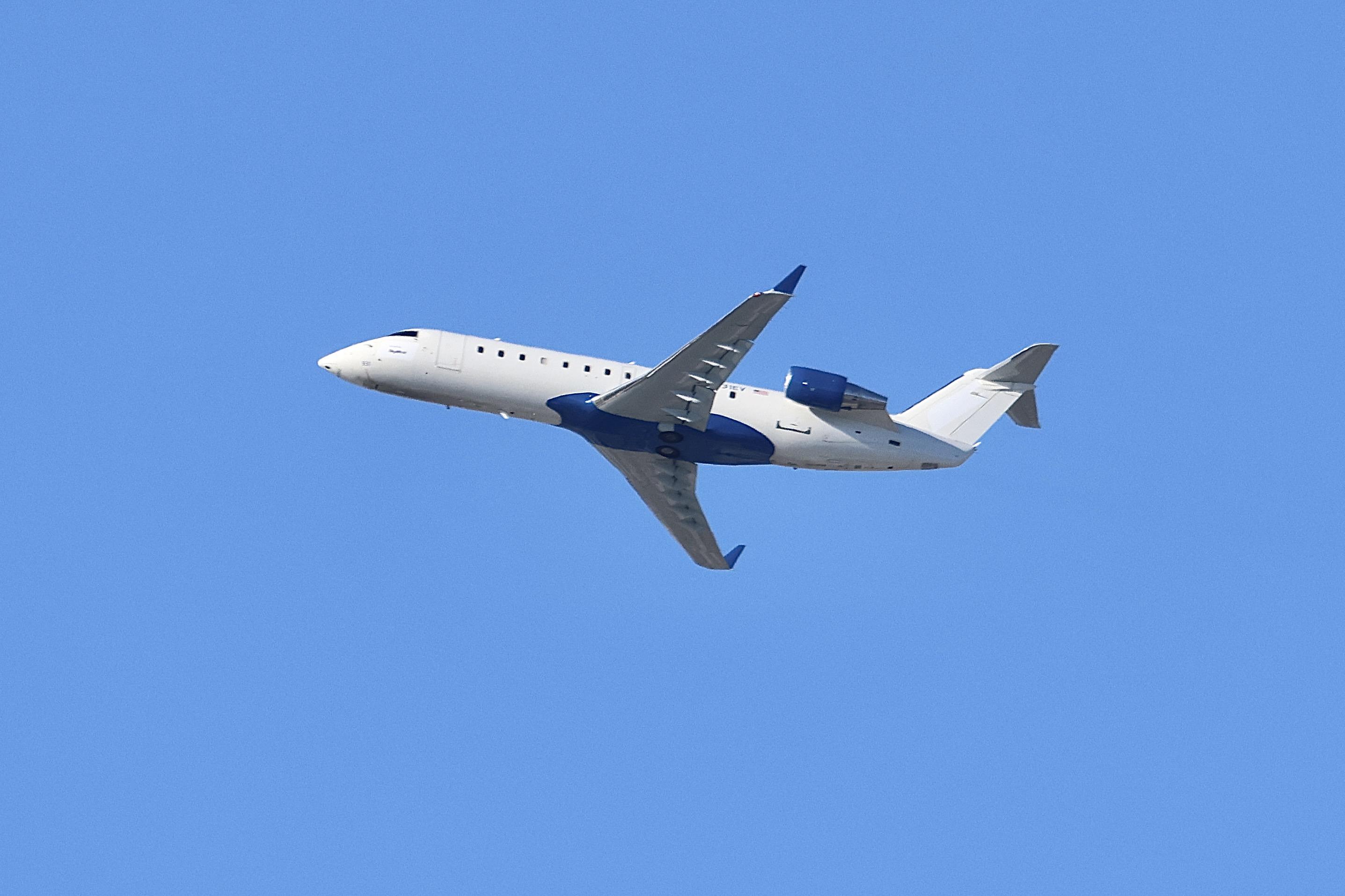 N931EV @ KORD - CRJ2 SkyWest / United Express Bombardier CRJ-200LR N931EV departing 28R KORD - by MarkKalfas