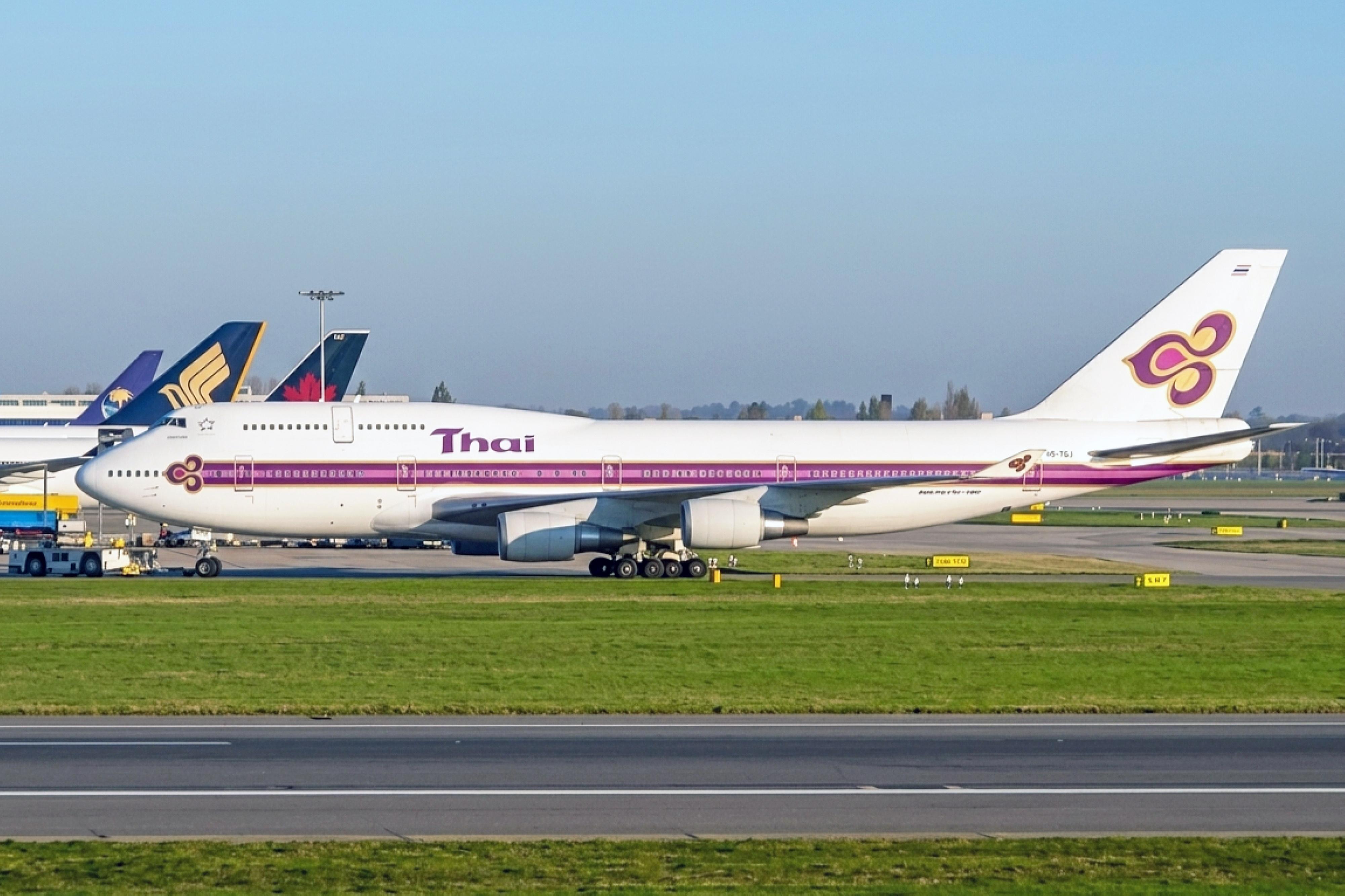 HS-TGJ @ EGLL - HS-TGJ 1990 B747-400 Thai International LHR
 - by PhilR