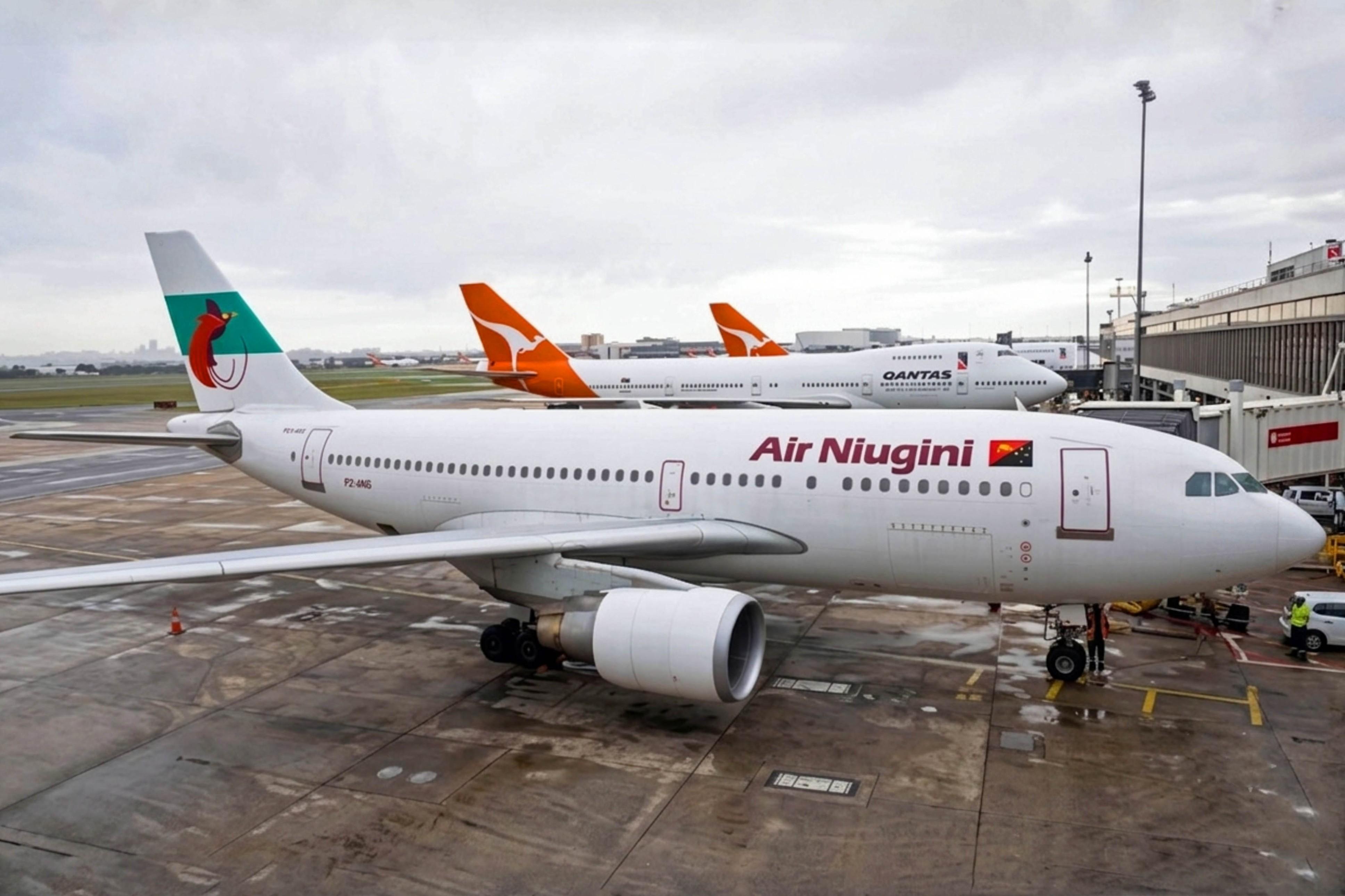 P2-ANG @ YSSY - P2-ANG 1990 A310-300 Air Nuigini SYD  - by PhilR