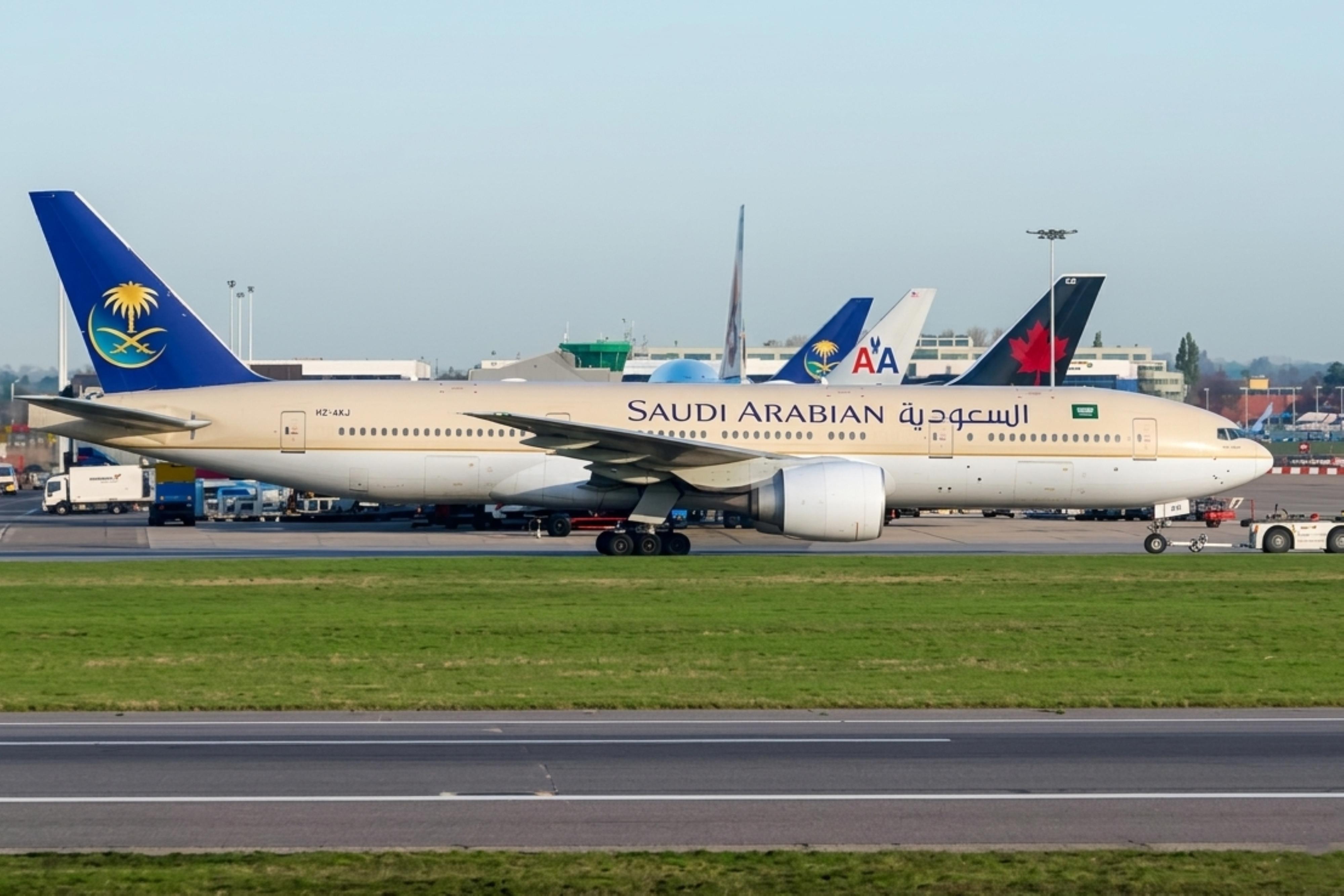HZ-AKJ @ EGLL - HZ-AKJ 1998 B777-200 Saudia LHR  - by PhilR