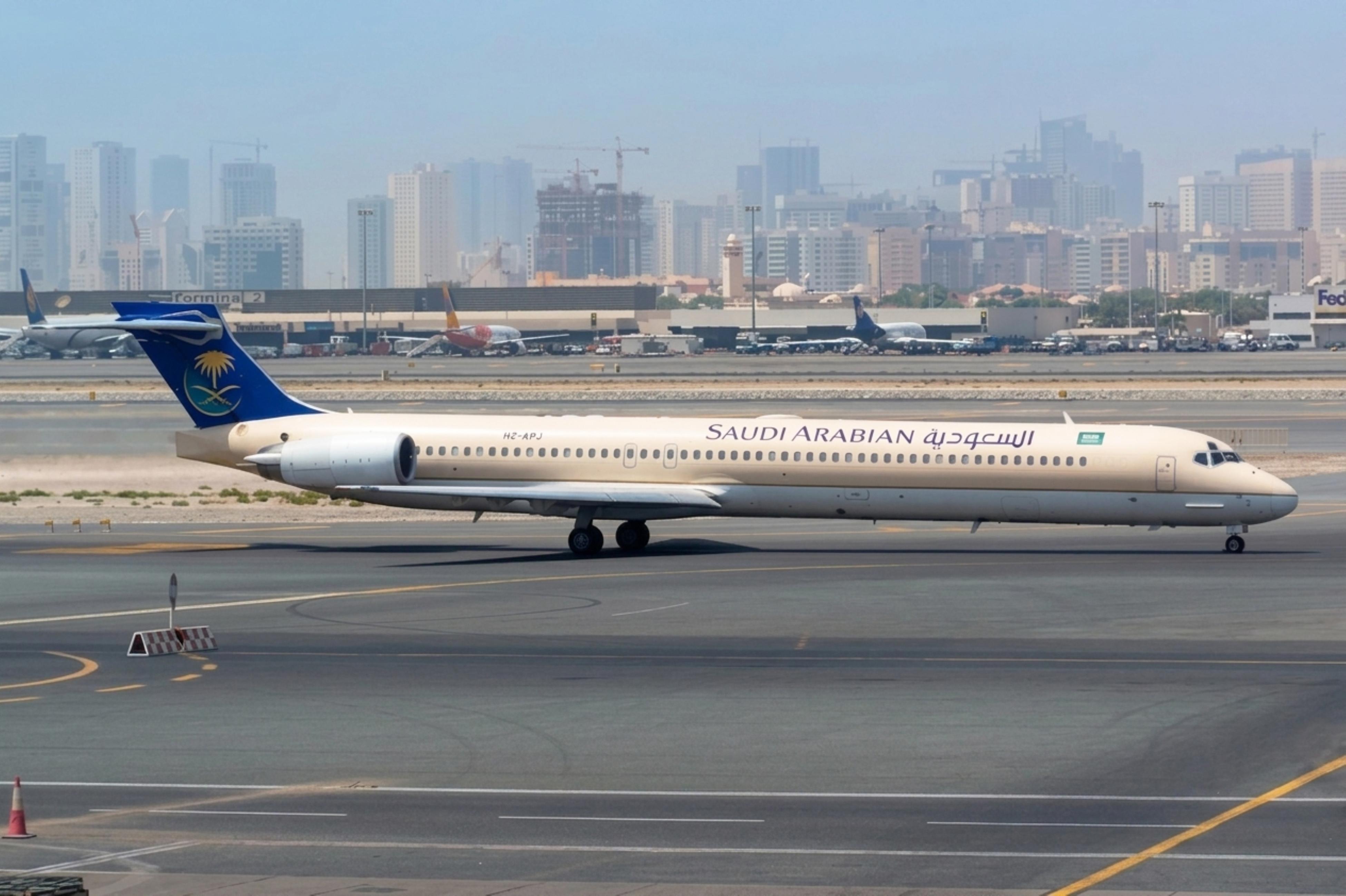 HZ-APJ @ OMDB - HZ-APJ 1998 MD90 Saudia DXB  - by PhilR