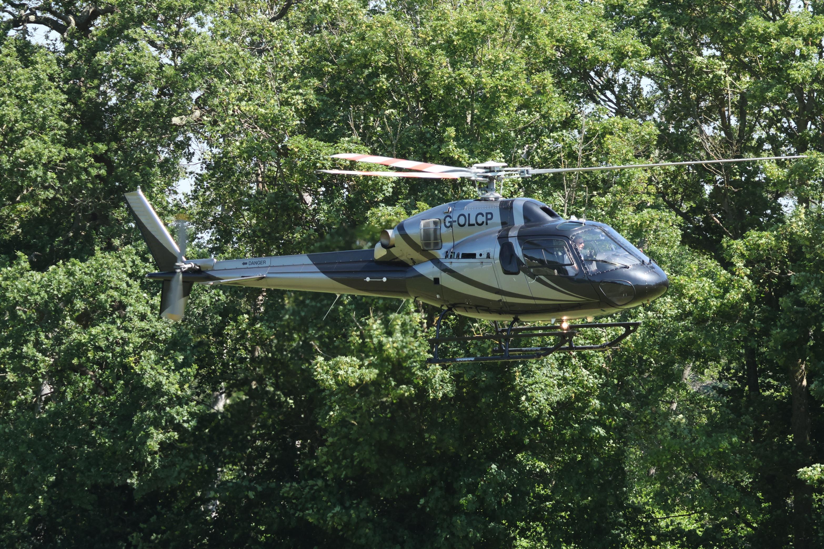 G-OLCP @ ASCOT - G-OLCP 1994 Eurocopter France AS355N Ecureuil ll Ascot Heliport
 - by PhilR