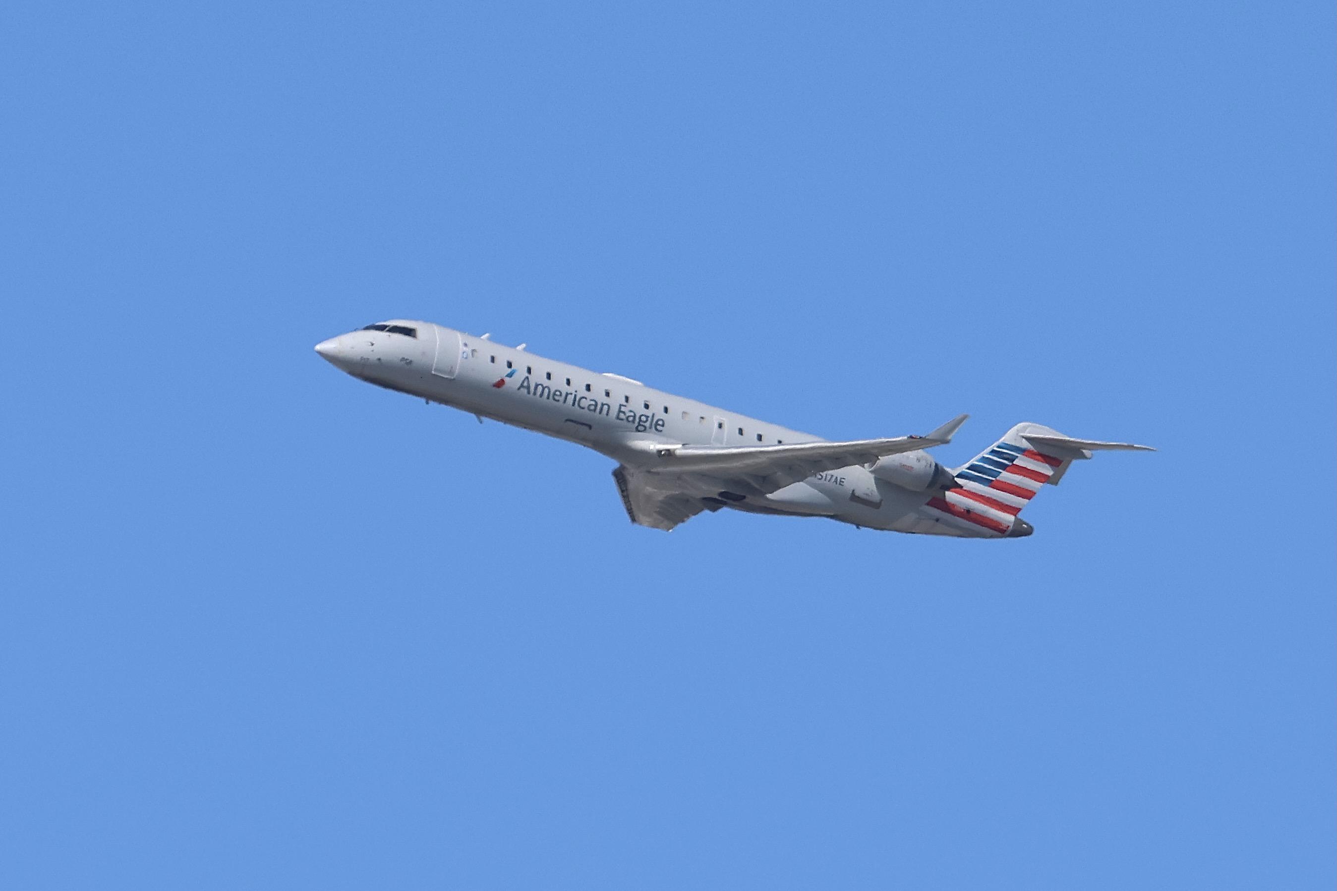 N517AE @ KORD - CRJ7 PSA / American Eagle Bombardier CRJ-701ER N517AE departing 27L KORD - by MarkKalfas