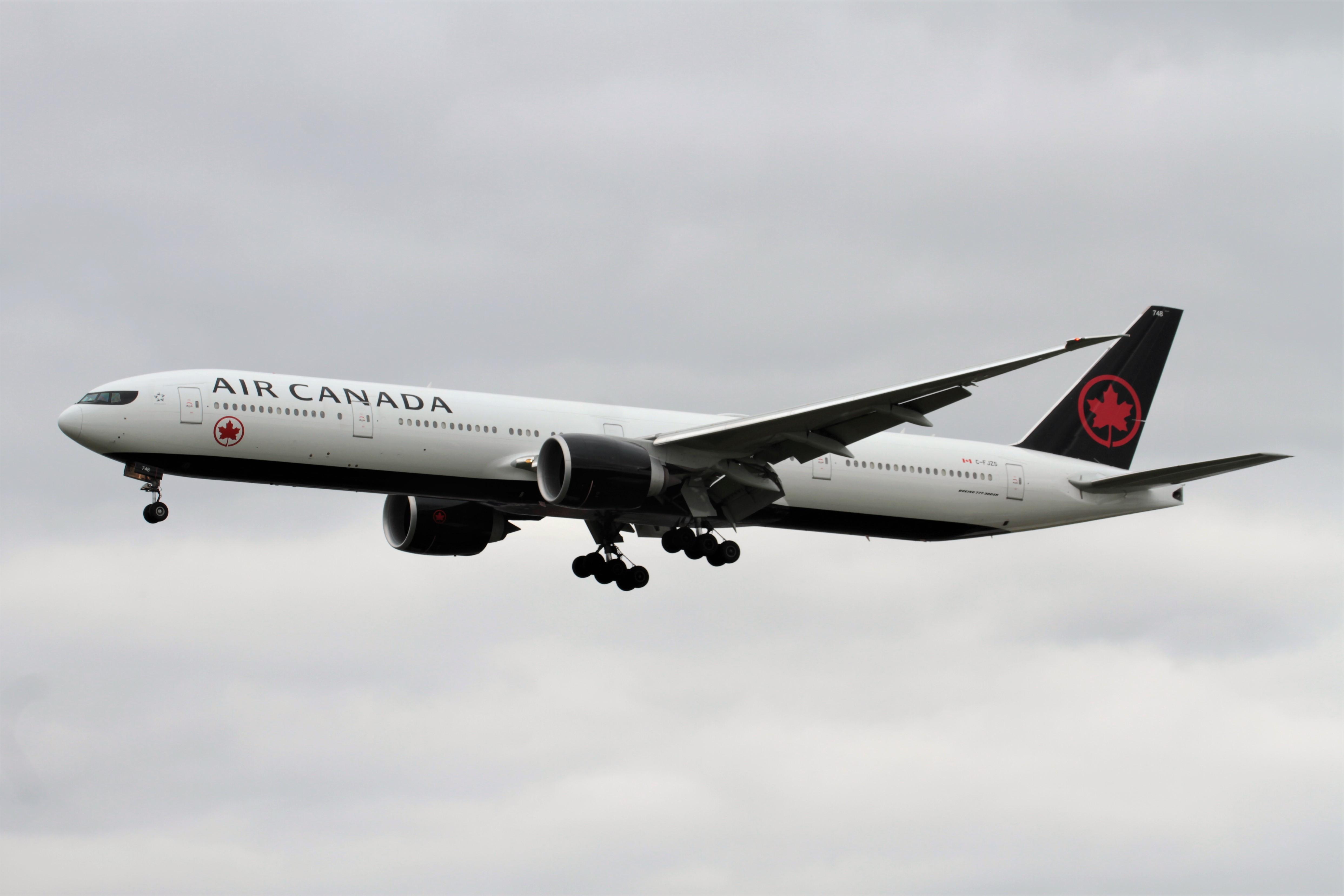 C-FJZS @ EGLL - C-FJZS 2016 B777-300 Bedfont LHR  - by PhilR