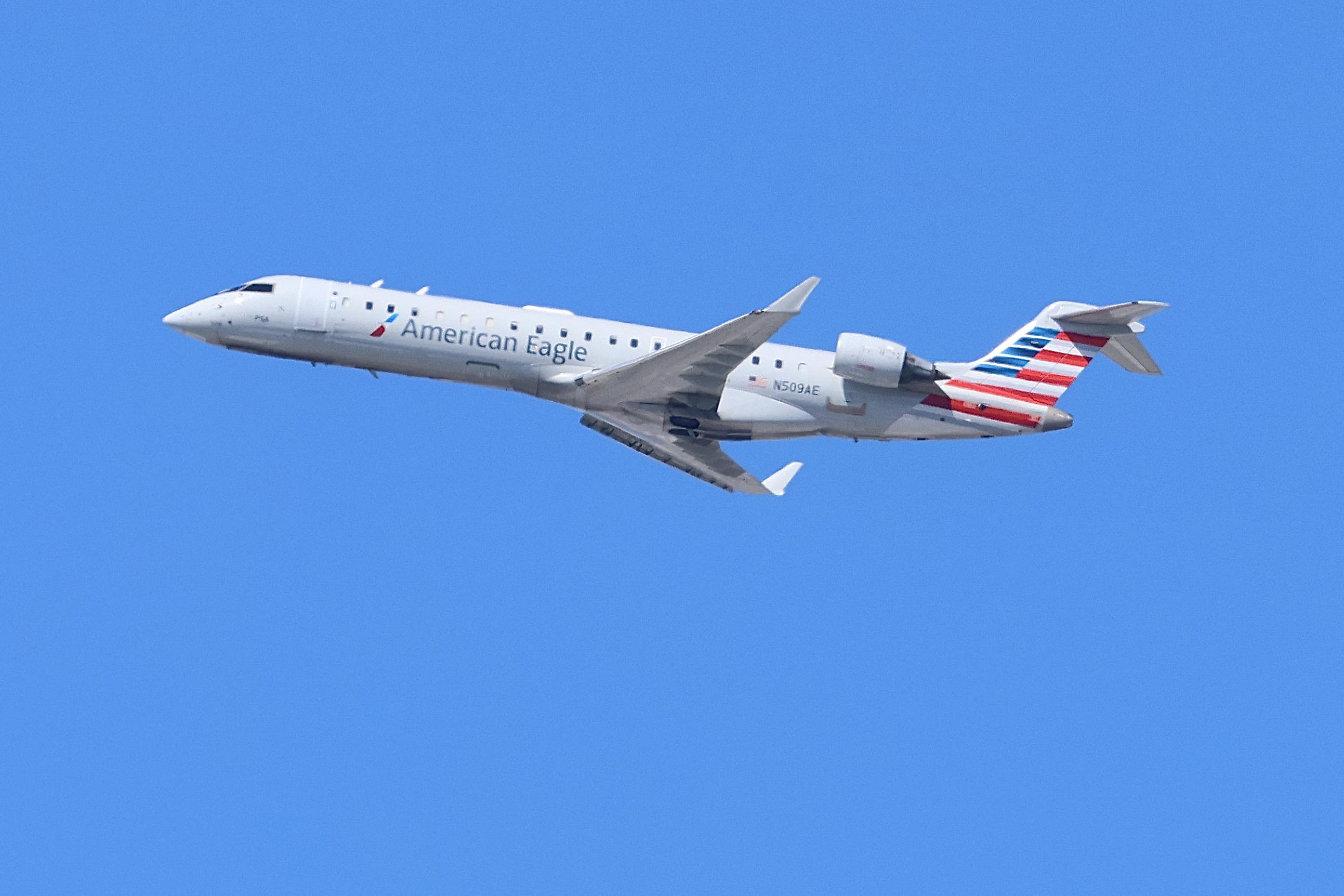 N509AE @ KORD - CRJ7 PSA /American Eagle Canadair Regional Jet CRJ-700 N509AE departing 27L KORD - by MarkKalfas