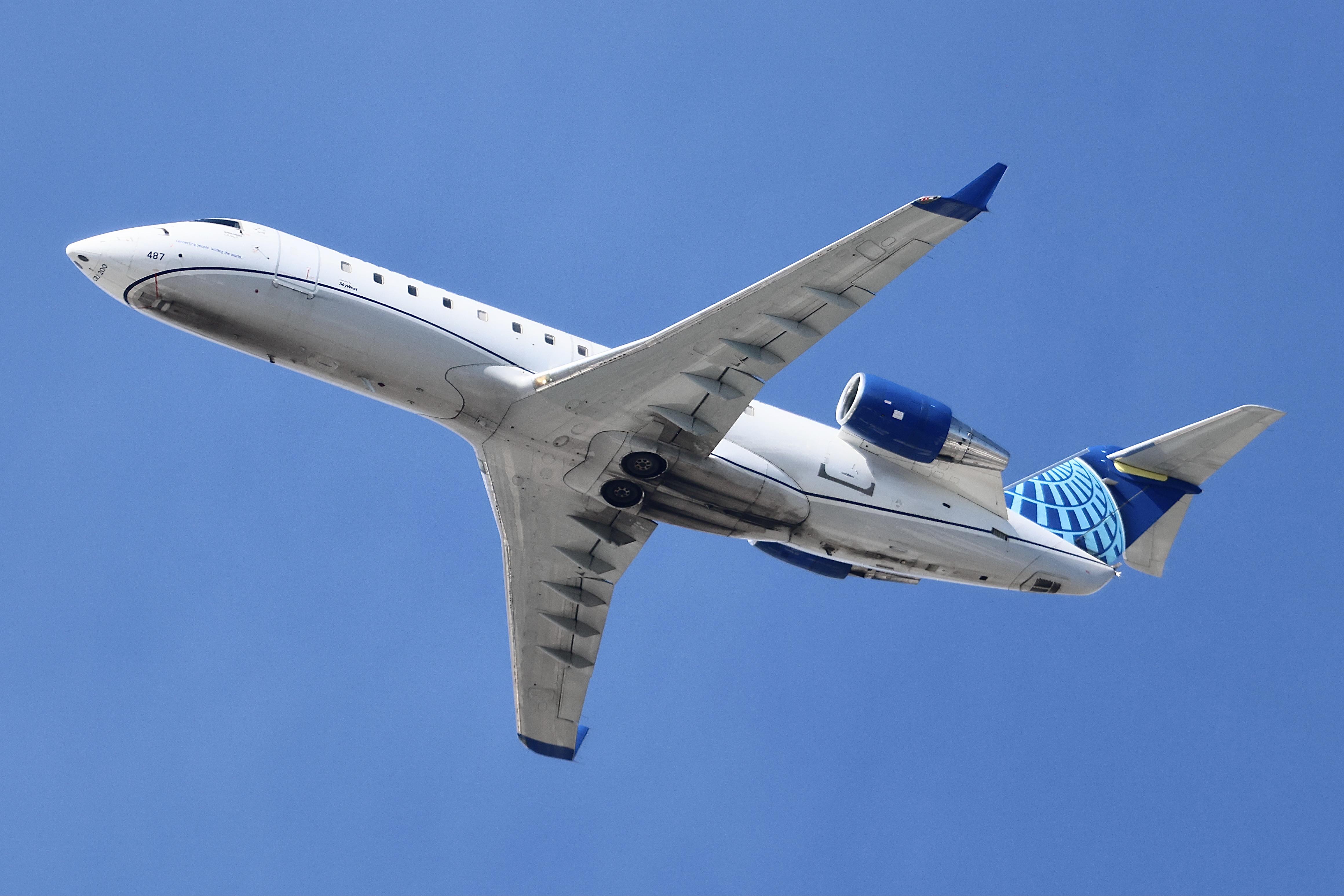 N487CA @ KORD - CRJ2 SkyWest / United Express Bombardier CRJ-200ER, N487CA departing 28L KORD - by MarkKalfas
