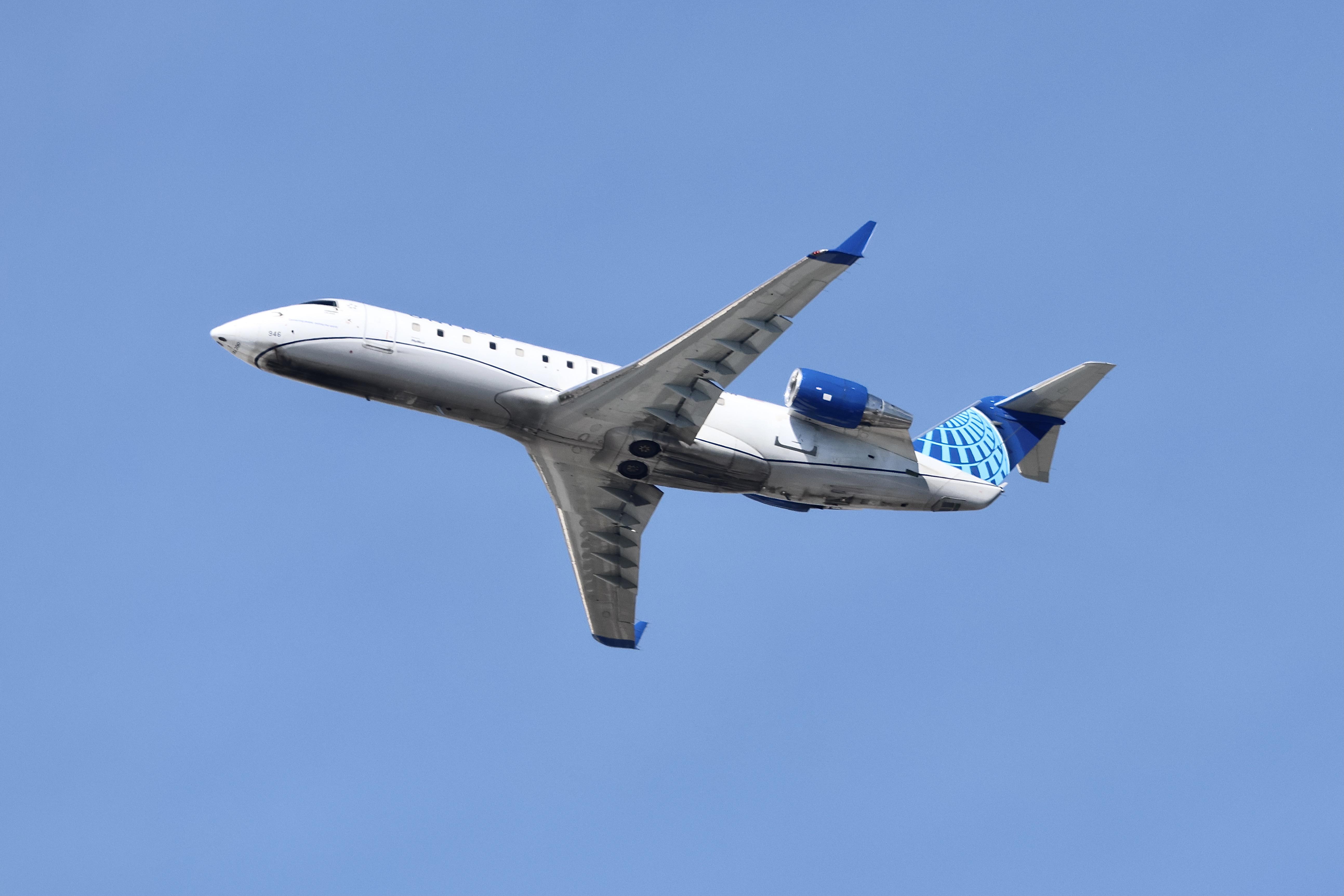 N946SW @ KORD - CRJ2 SkyWest / United Express Bombardier CRJ-200LR (CL-600-2B19) N946SW departing 28R KORD - by MarkKalfas