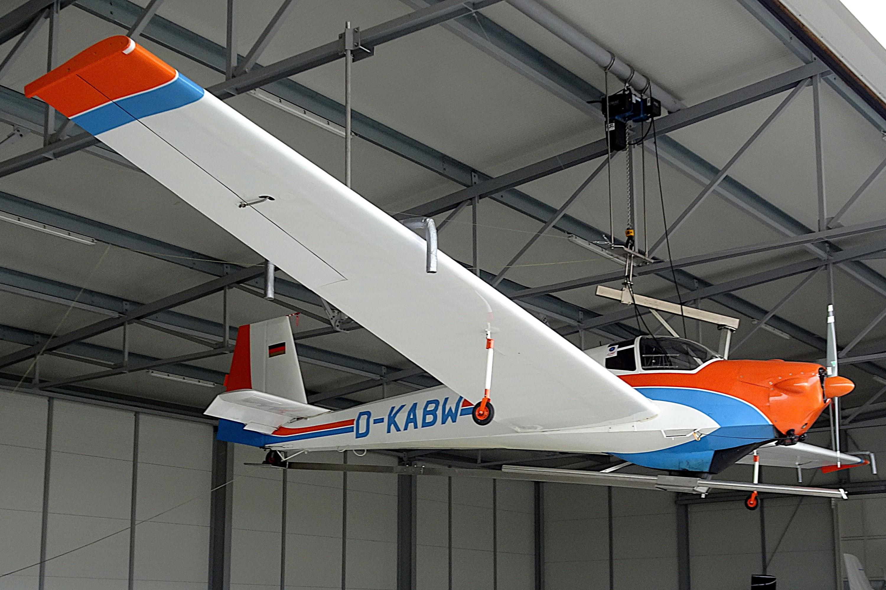 D-KABW @ EDQA - Motorfalke at the ceiling of a hangar at Bamberg (EDQA), Germany - by ReinhardJost