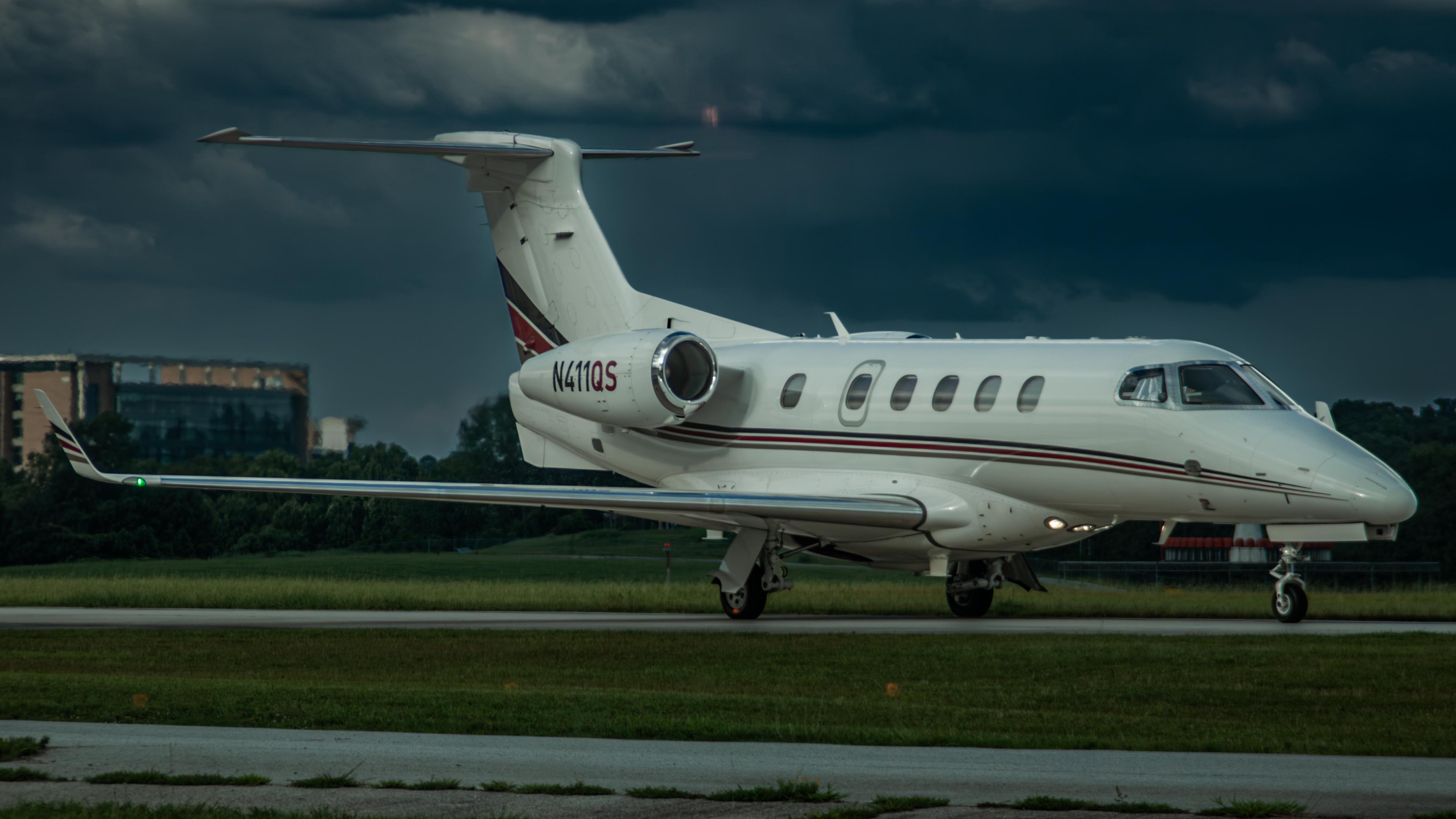 N411QS @ KPDK - NetJets Phenom 300 - by AviationLover50