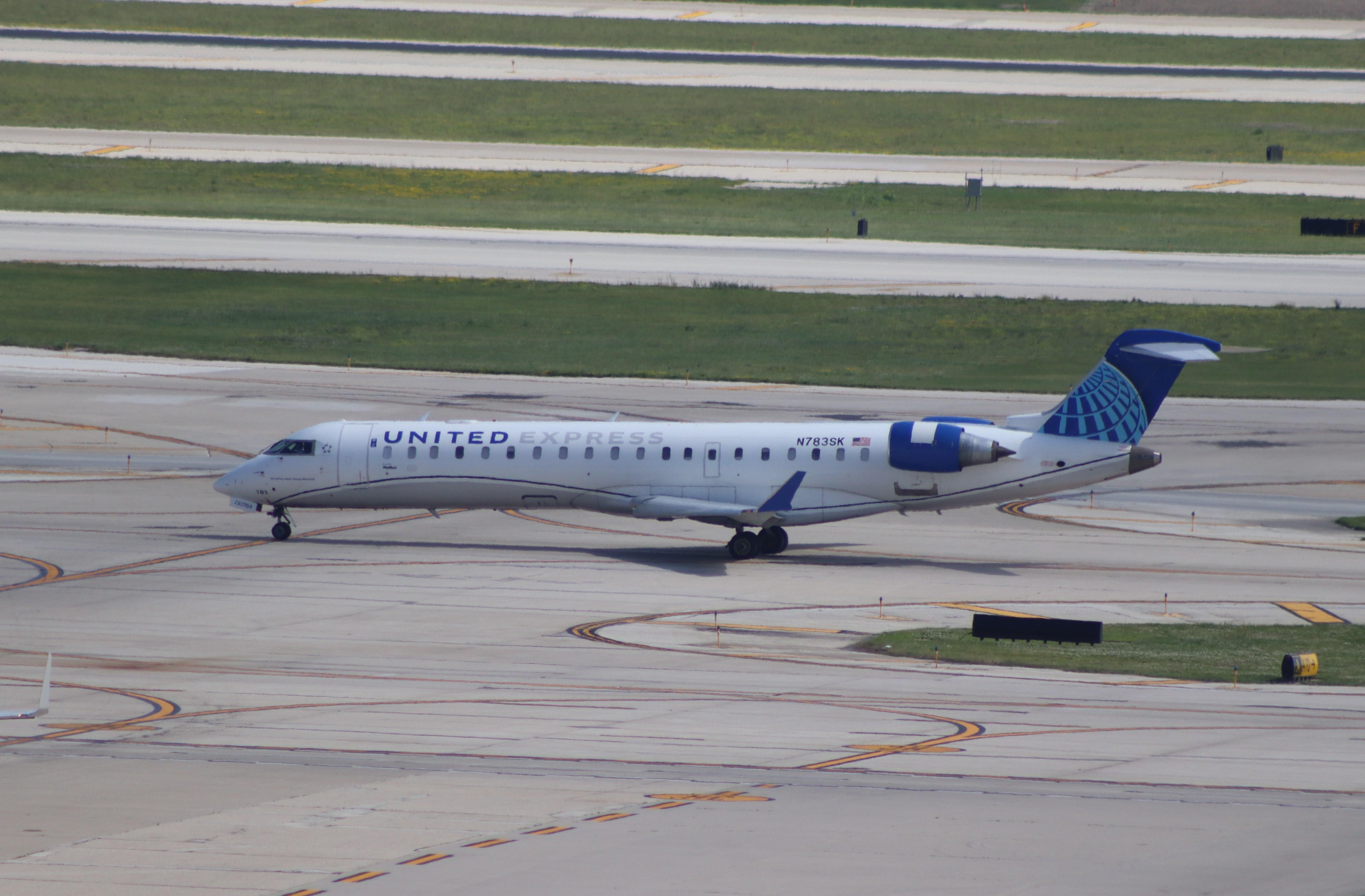 Aircraft N783SK, CL-600-2C10, at KORD, photo by MarkPasqualino