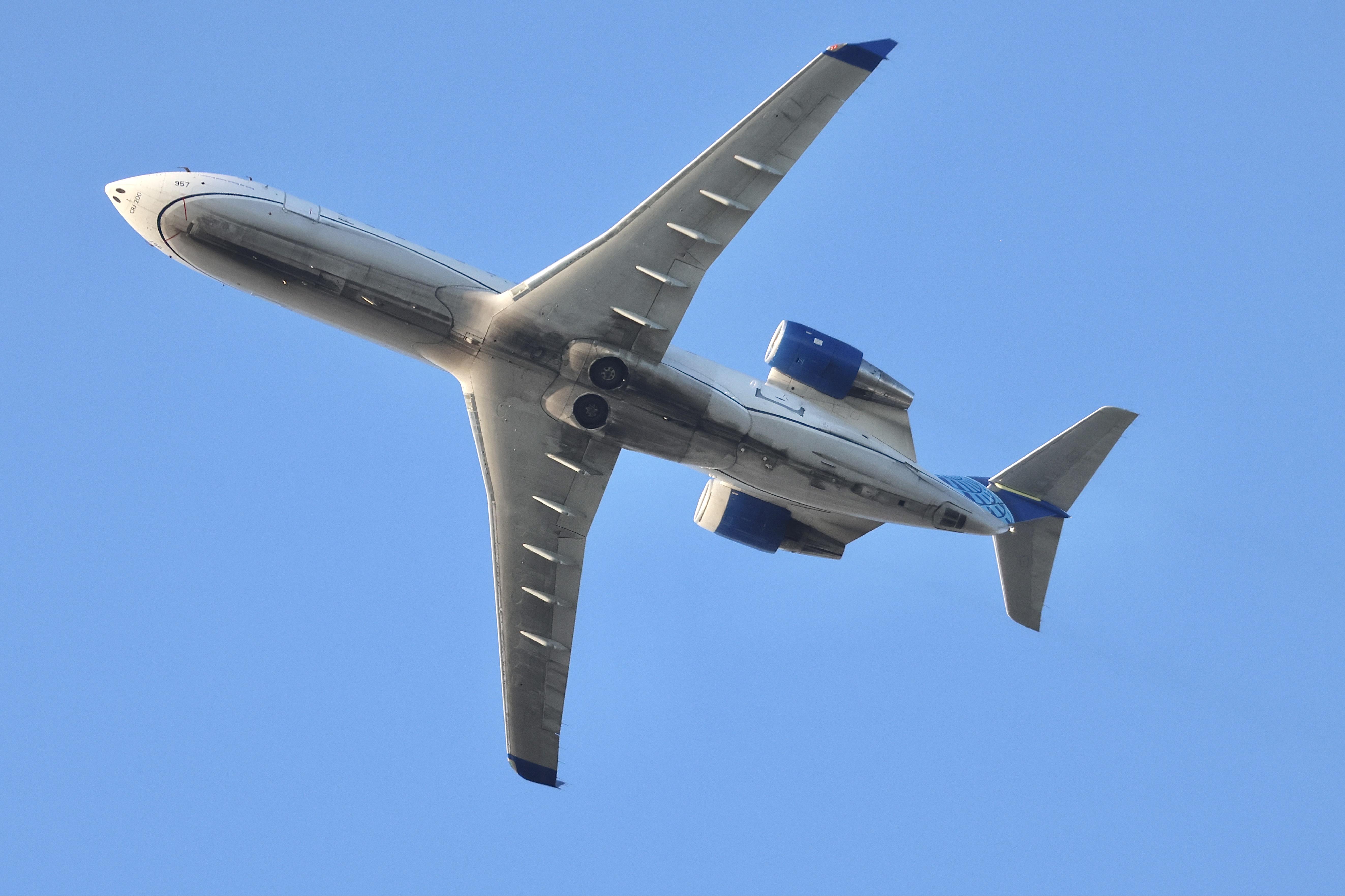 N957SW @ KORD - CRJ2 SkyWest;.United Express CL-600-2B19, N957SW departing 28R KORD - by MarkKalfas