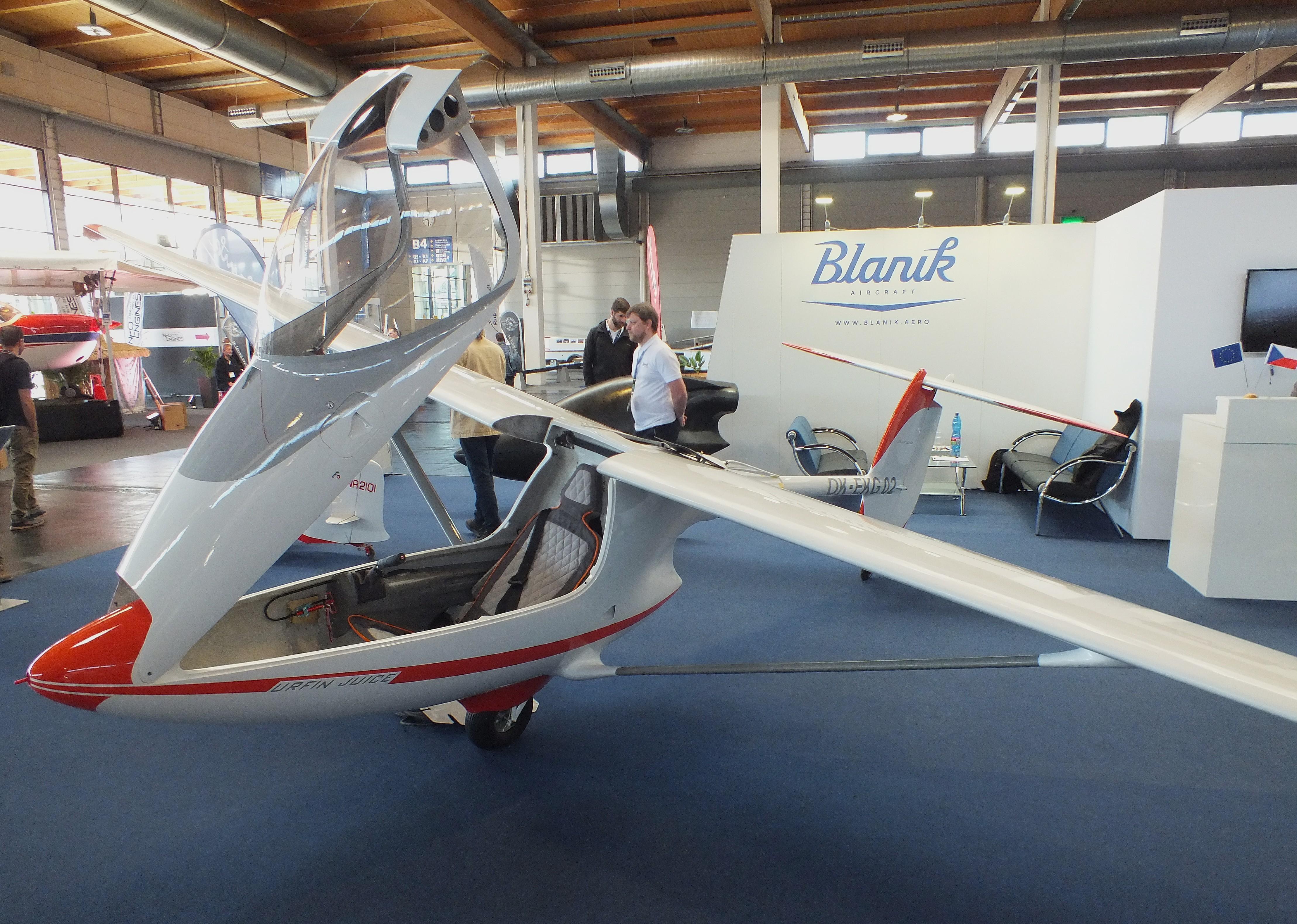 Aircraft OK-EKG02, Blanik Aircraft Urfin Juice first prototype with electric motor at the AERO 2026, Friedrichshafen, at EDNY, photo by iwarnecke