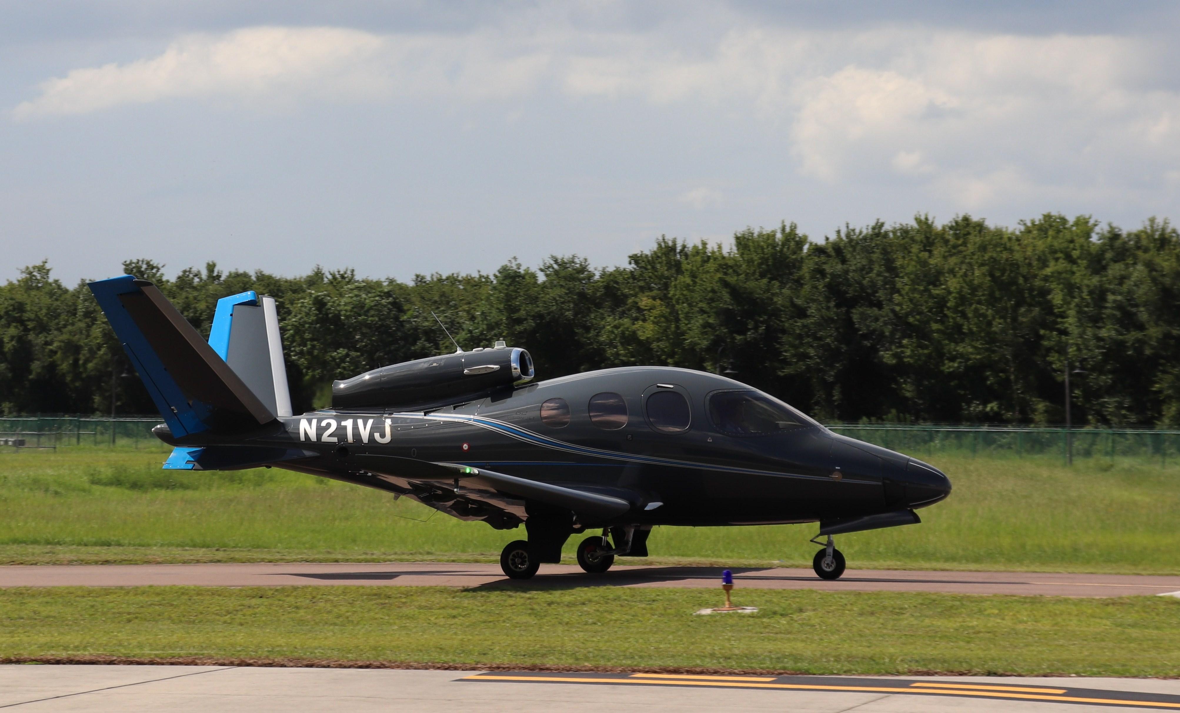 Aircraft N21VJ, Cirrus SF50, at KISM, photo by MarkPasqualino
