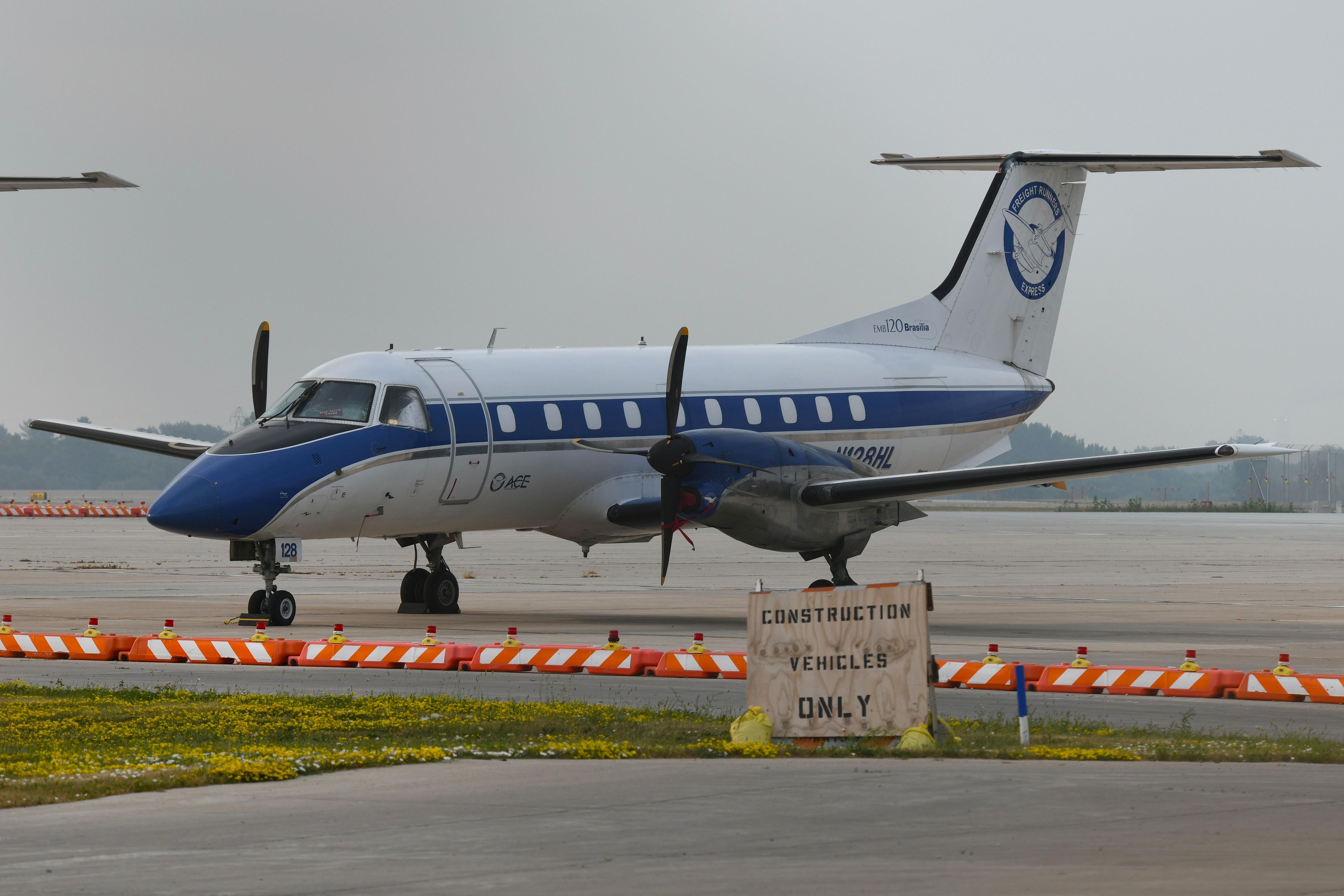 Aircraft N128HL, Freight Runners EMB120, at KMKE, photo by FerryPNL