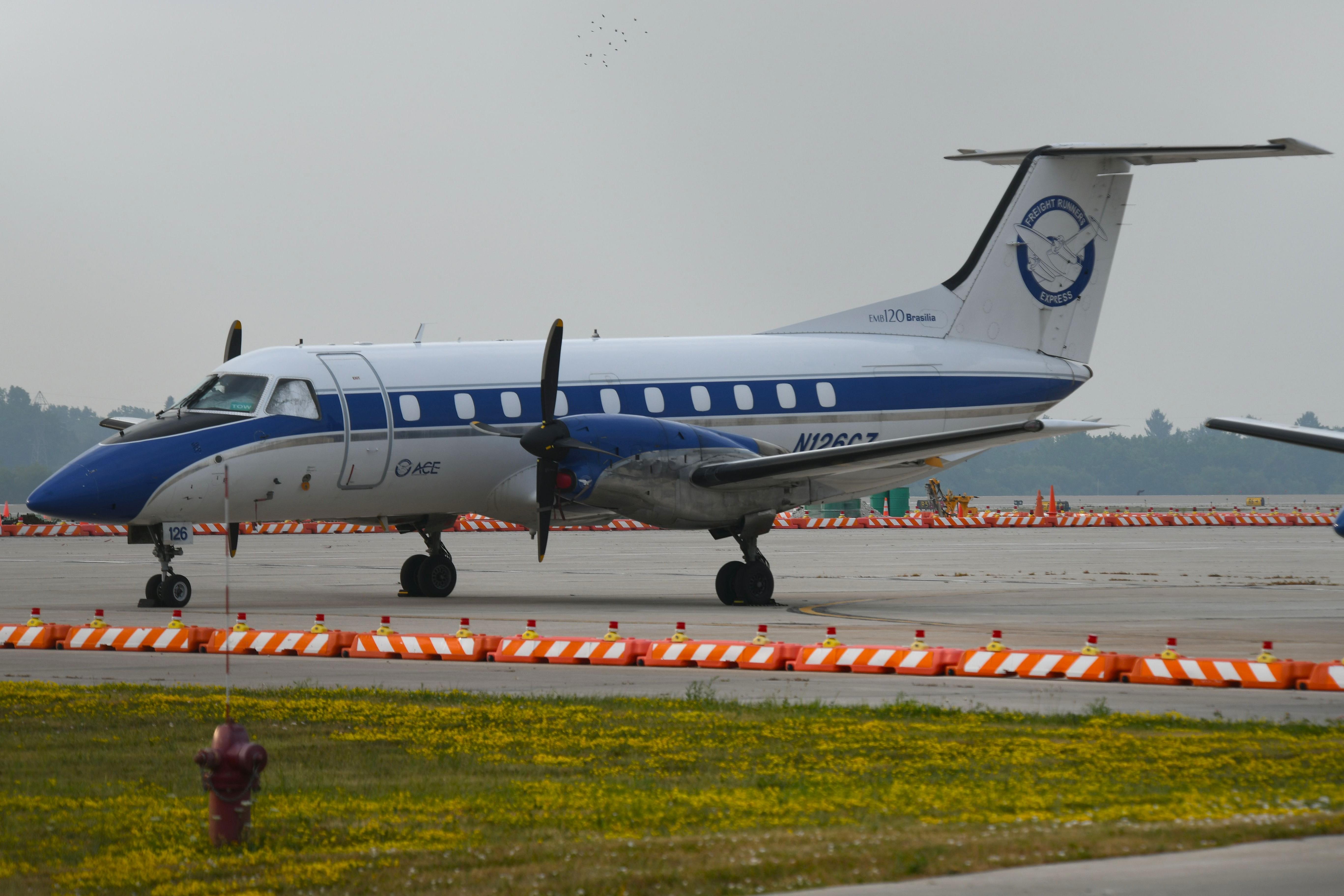 Aircraft N126CZ, EMB120 of Freight Runner Express, at KMKE, photo by FerryPNL