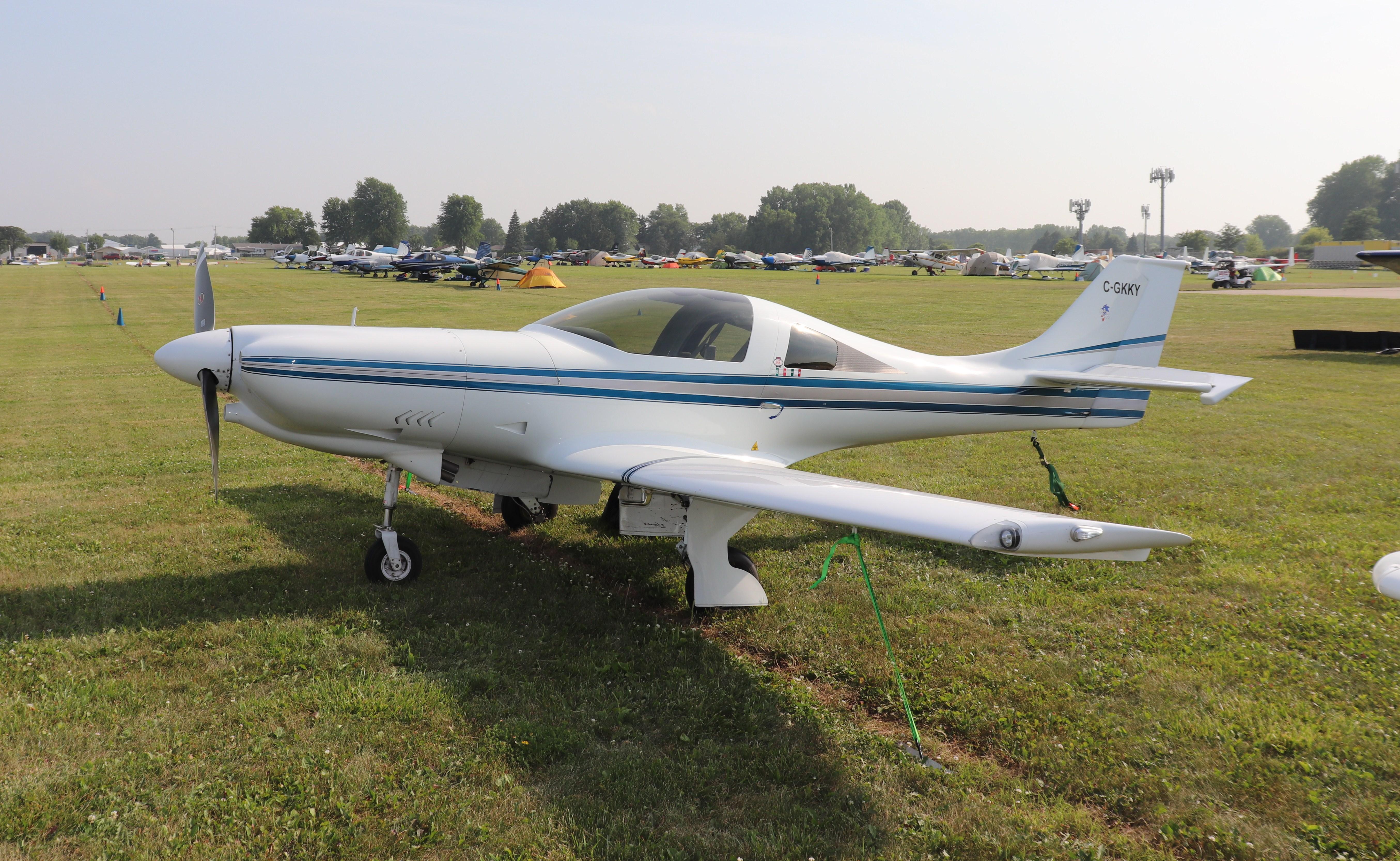 Aircraft C-GKKY, Lancair 320, at KOSH, photo by MarkPasqualino