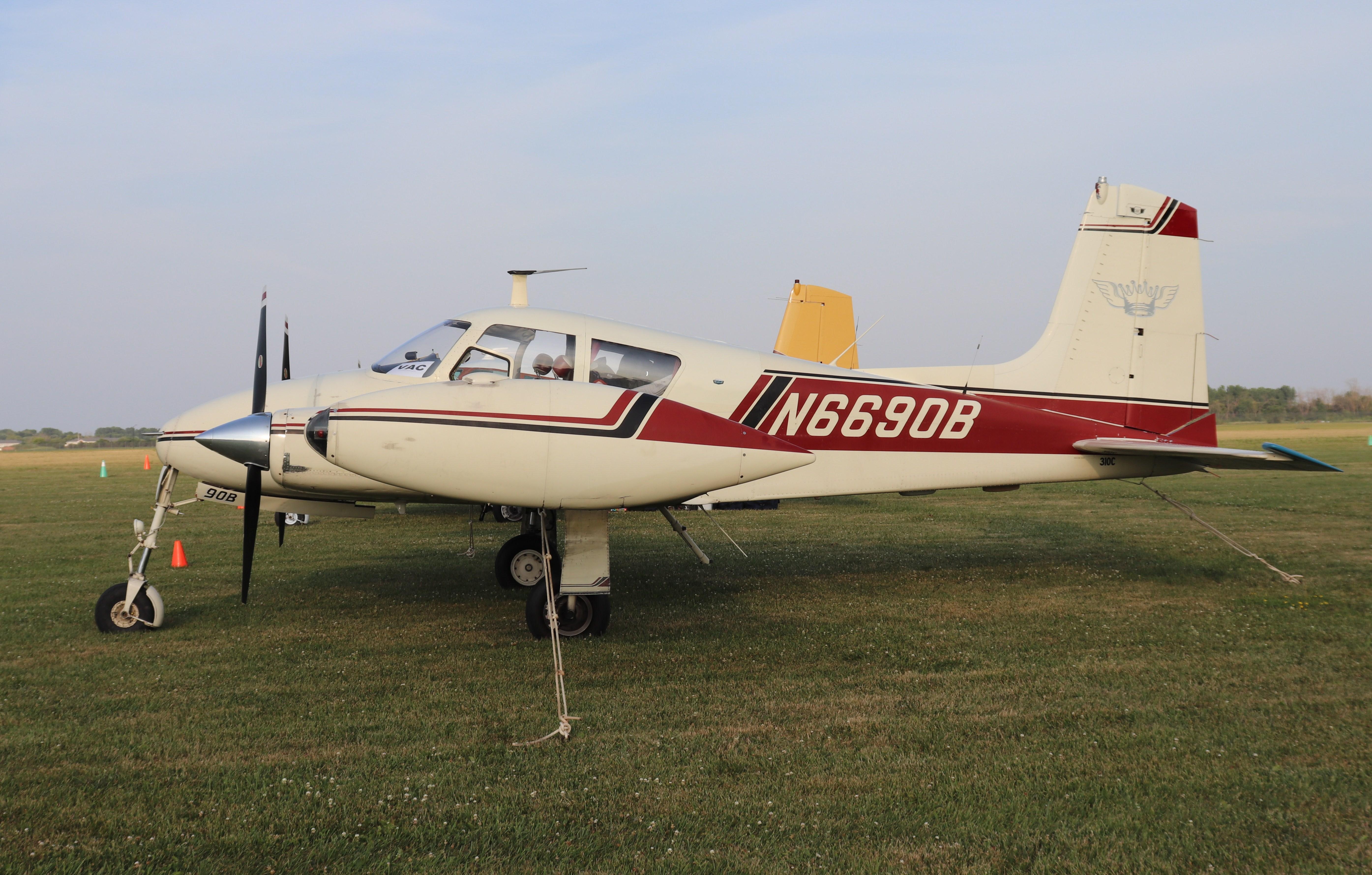 Aircraft N6690B, Cessna 310C, at KOSH, photo by MarkPasqualino