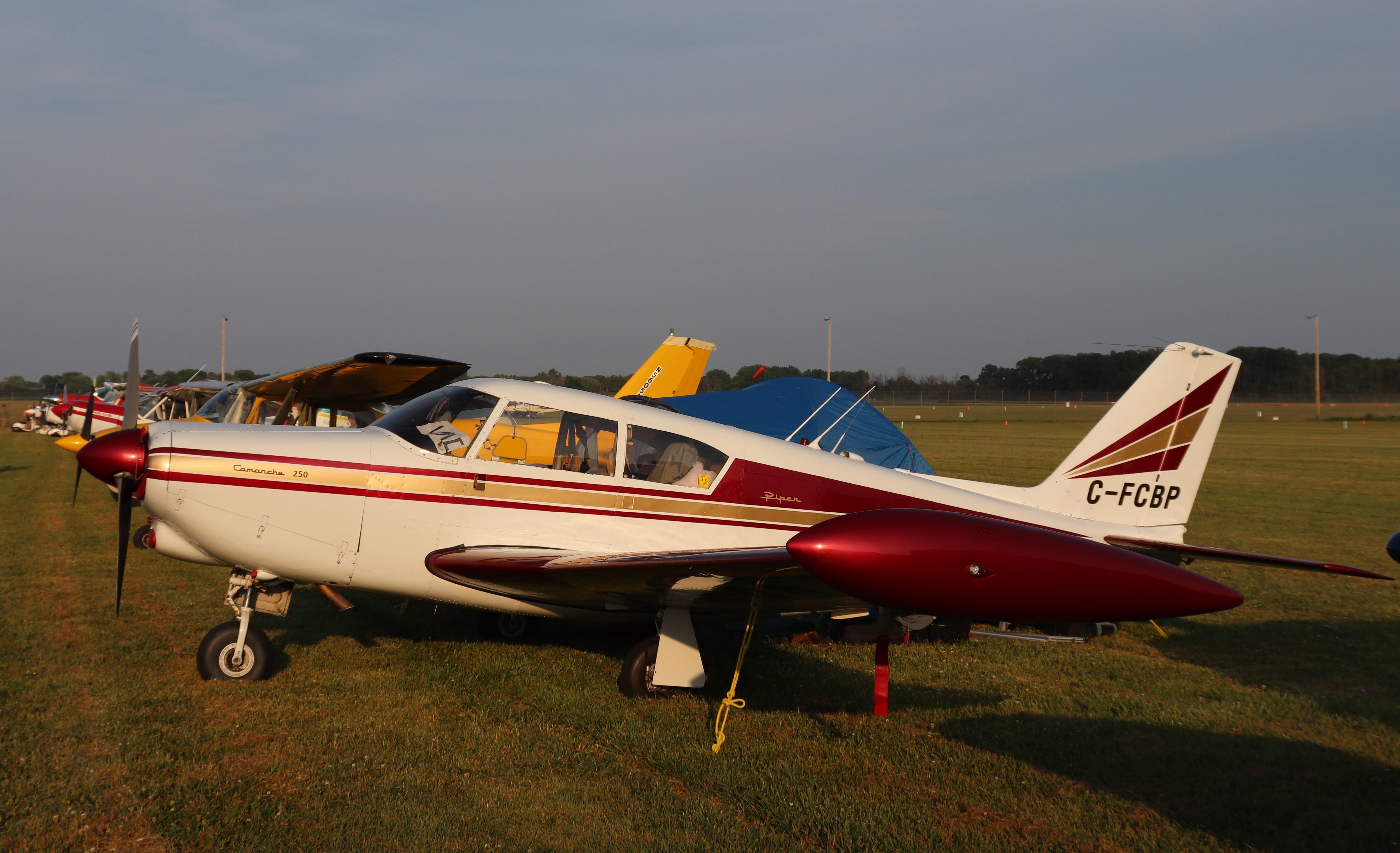 C-FCBP @ KOSH - Piper PA-24-250 - by MarkPasqualino