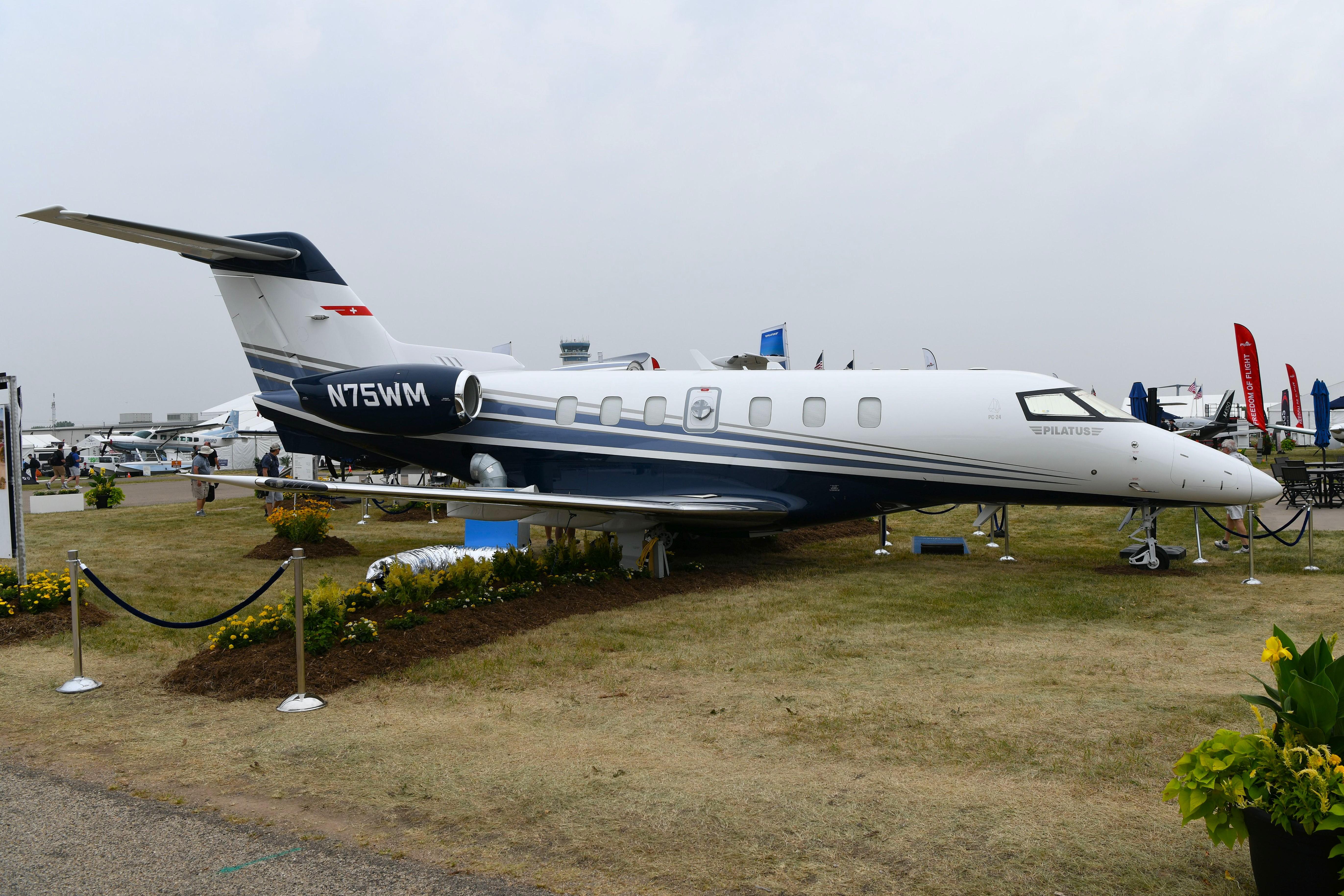 Aircraft N75WM, Pilatus PC24 display at OSH, at KOSH, photo by FerryPNL