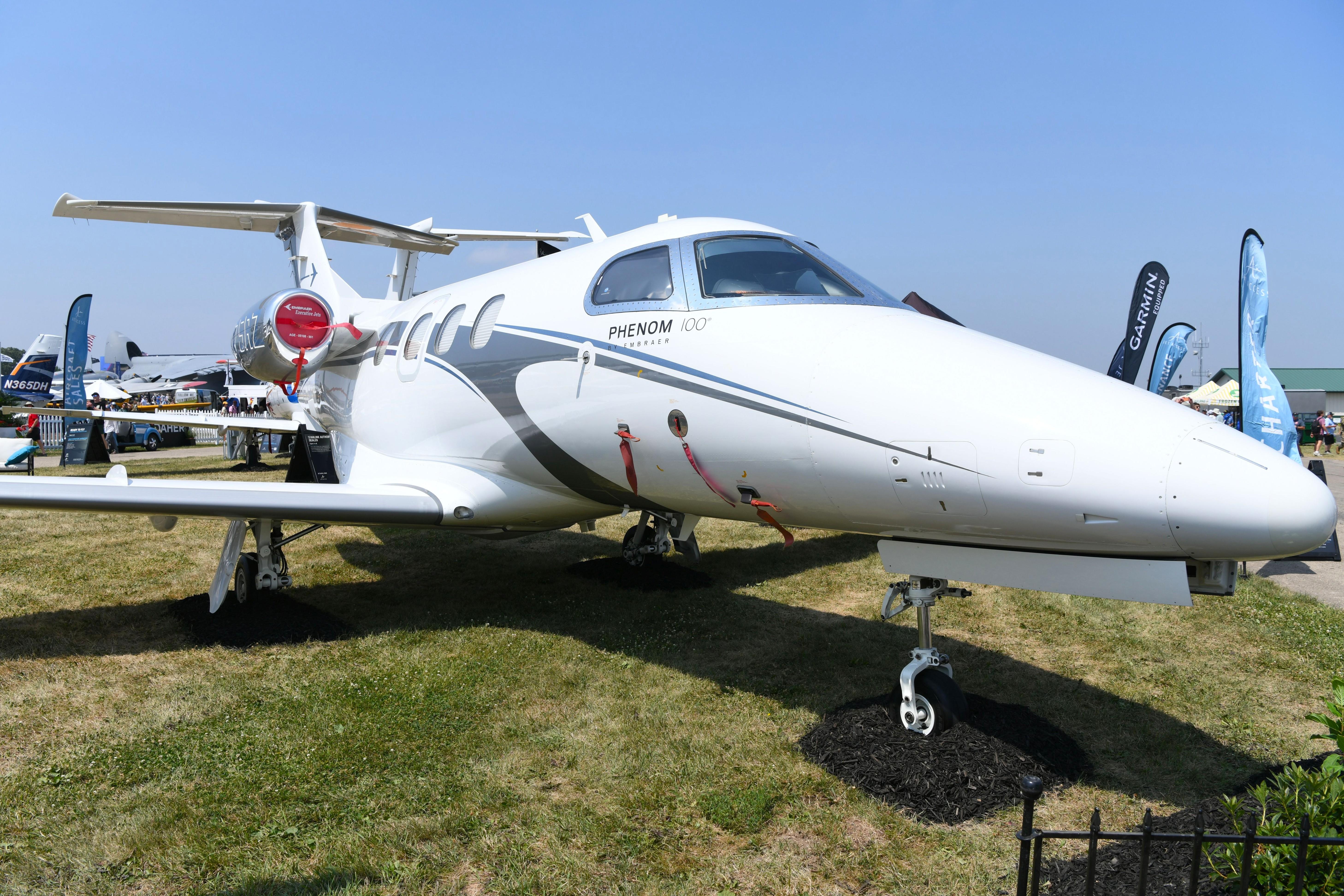 Aircraft N75RZ, Flying Phenom LLC EMB -500, at KOSH, photo by FerryPNL
