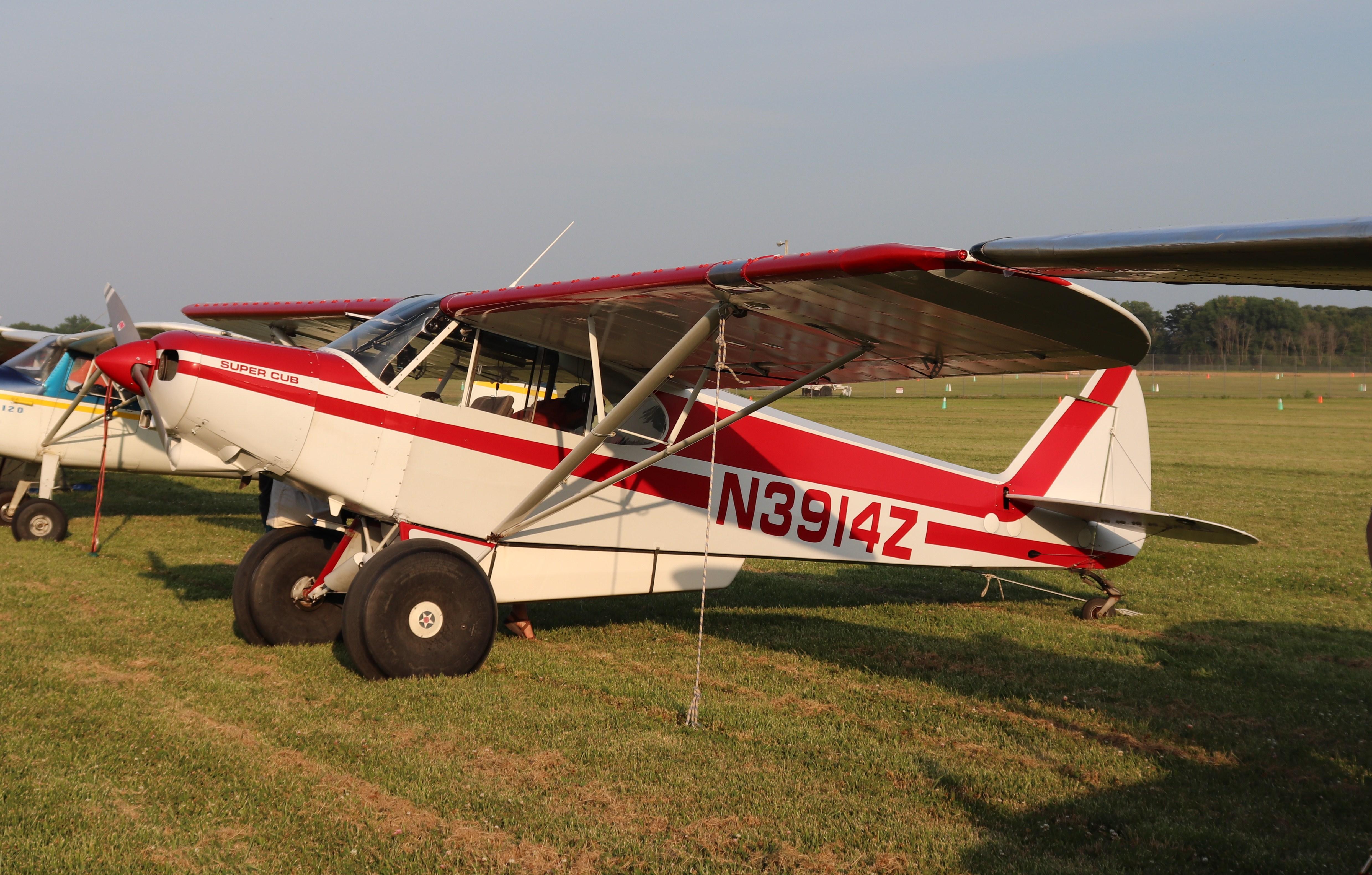 Aircraft N3914Z, Piper PA-18-150, at KOSH, photo by MarkPasqualino