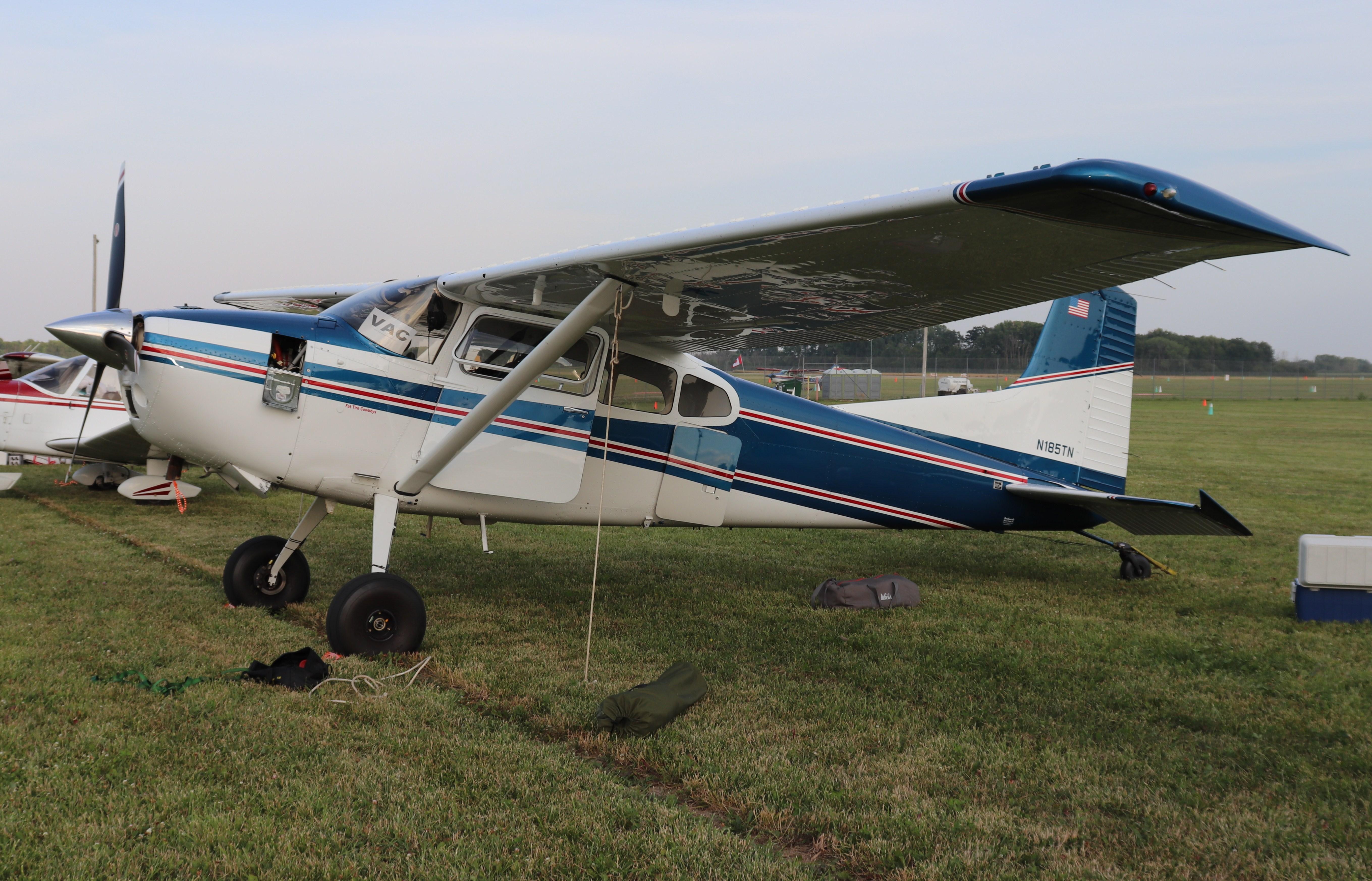 Aircraft N185TN, Cessna A185F, at KOSH, photo by MarkPasqualino