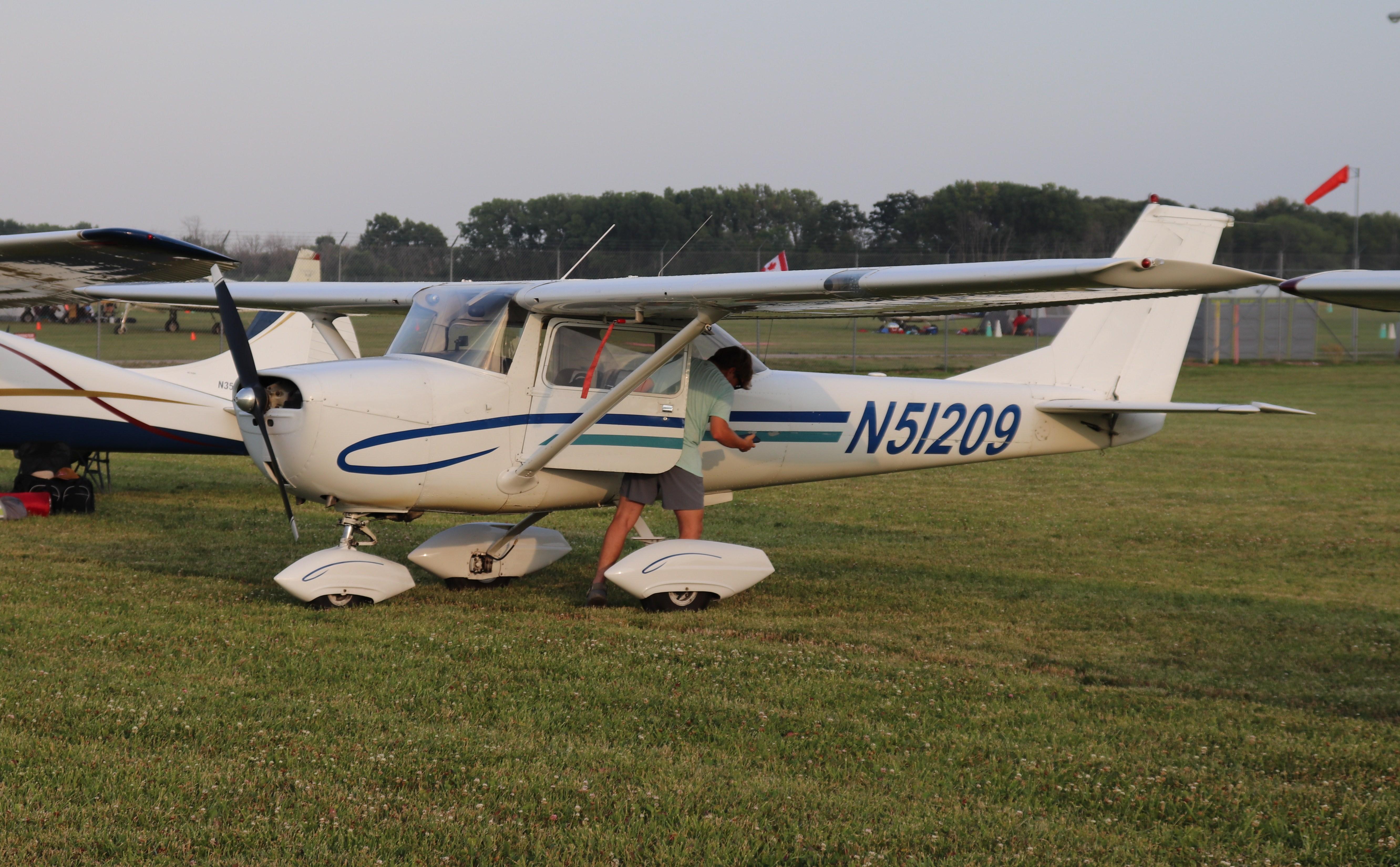 Aircraft N51209, Cessna 150J, at KOSH, photo by MarkPasqualino