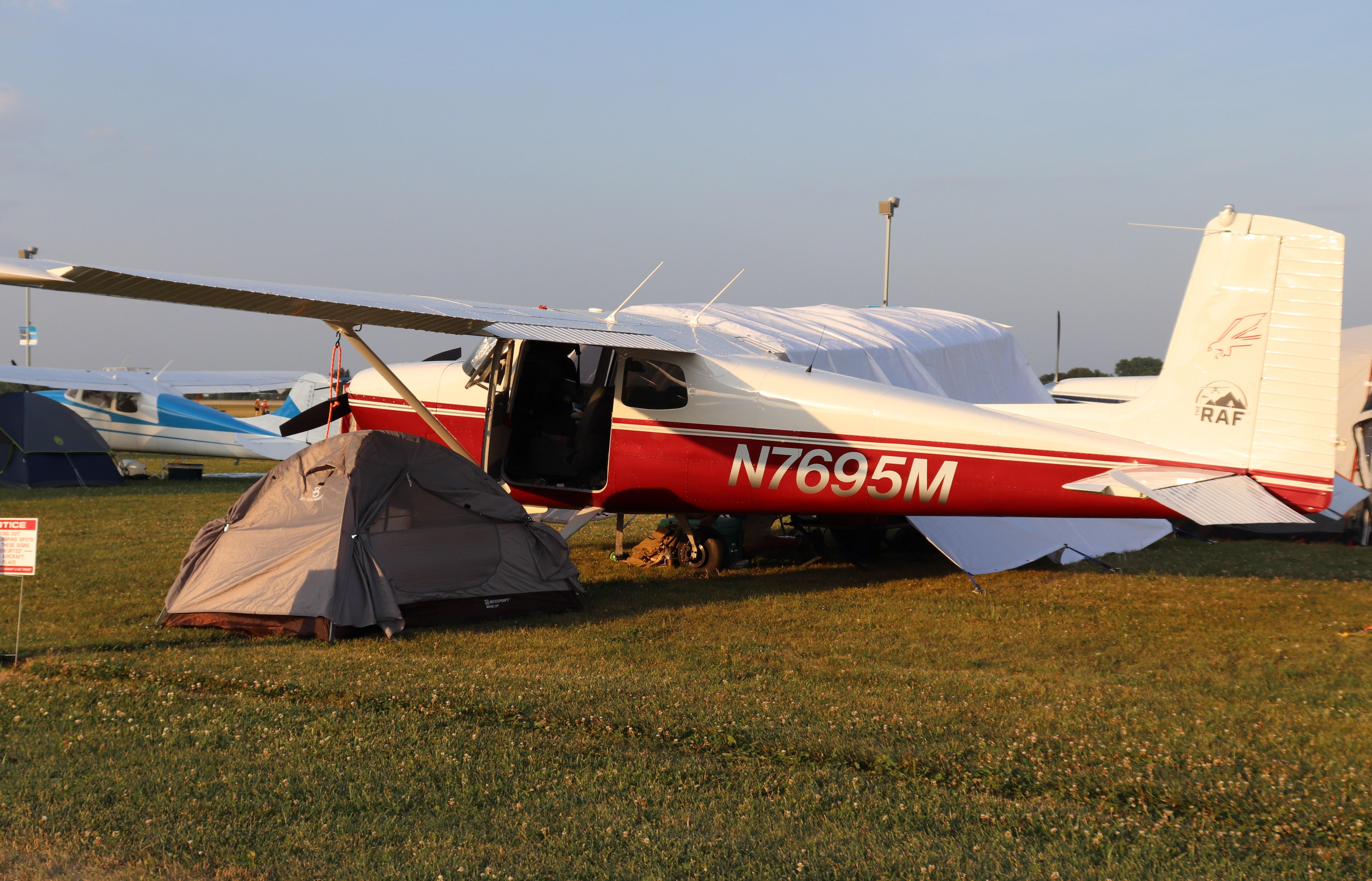 Aircraft N7695M, Cessna 175, at KOSH, photo by MarkPasqualino