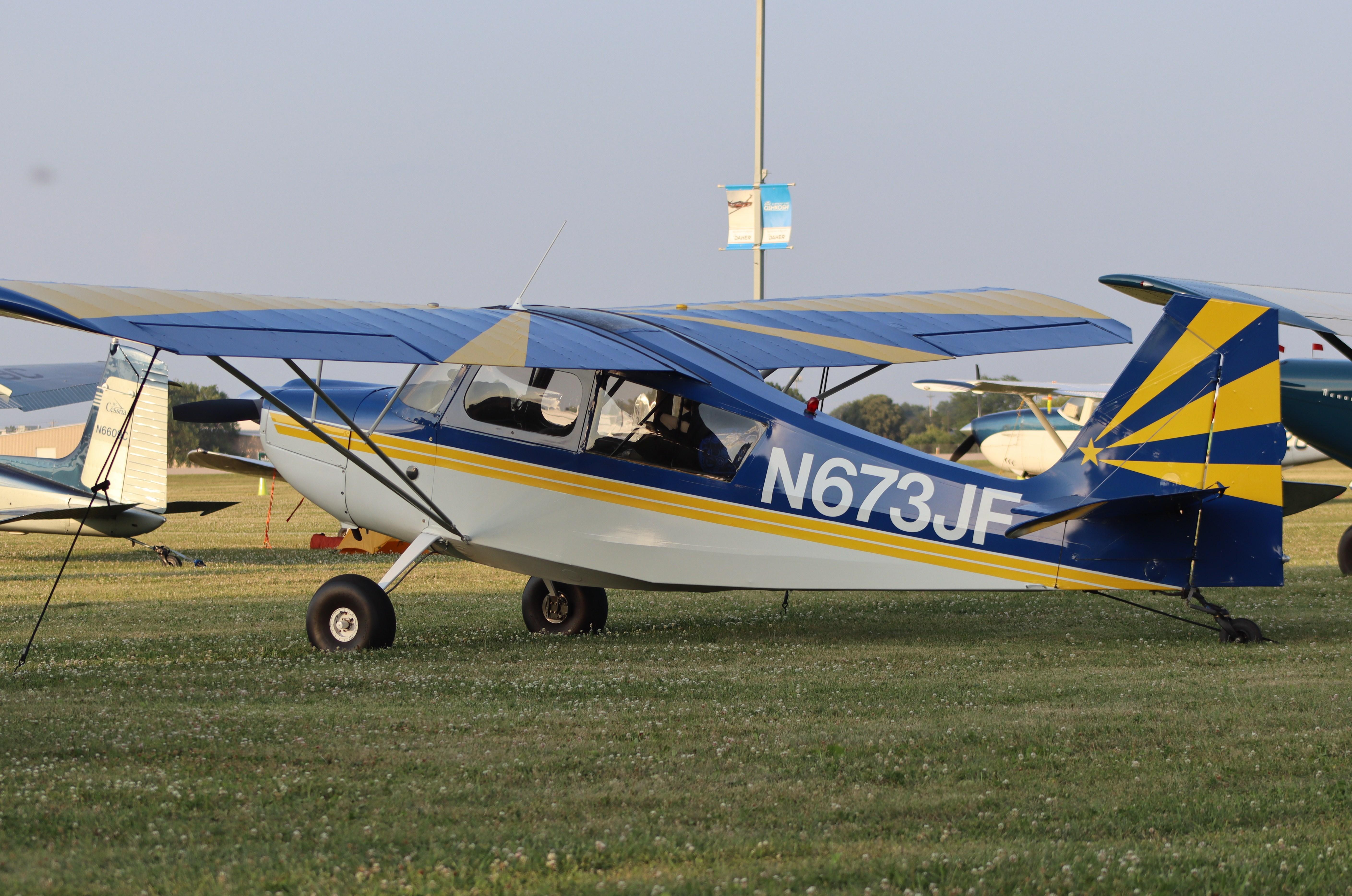 Aircraft N673JF, Champion 7KCAB, at KOSH, photo by MarkPasqualino