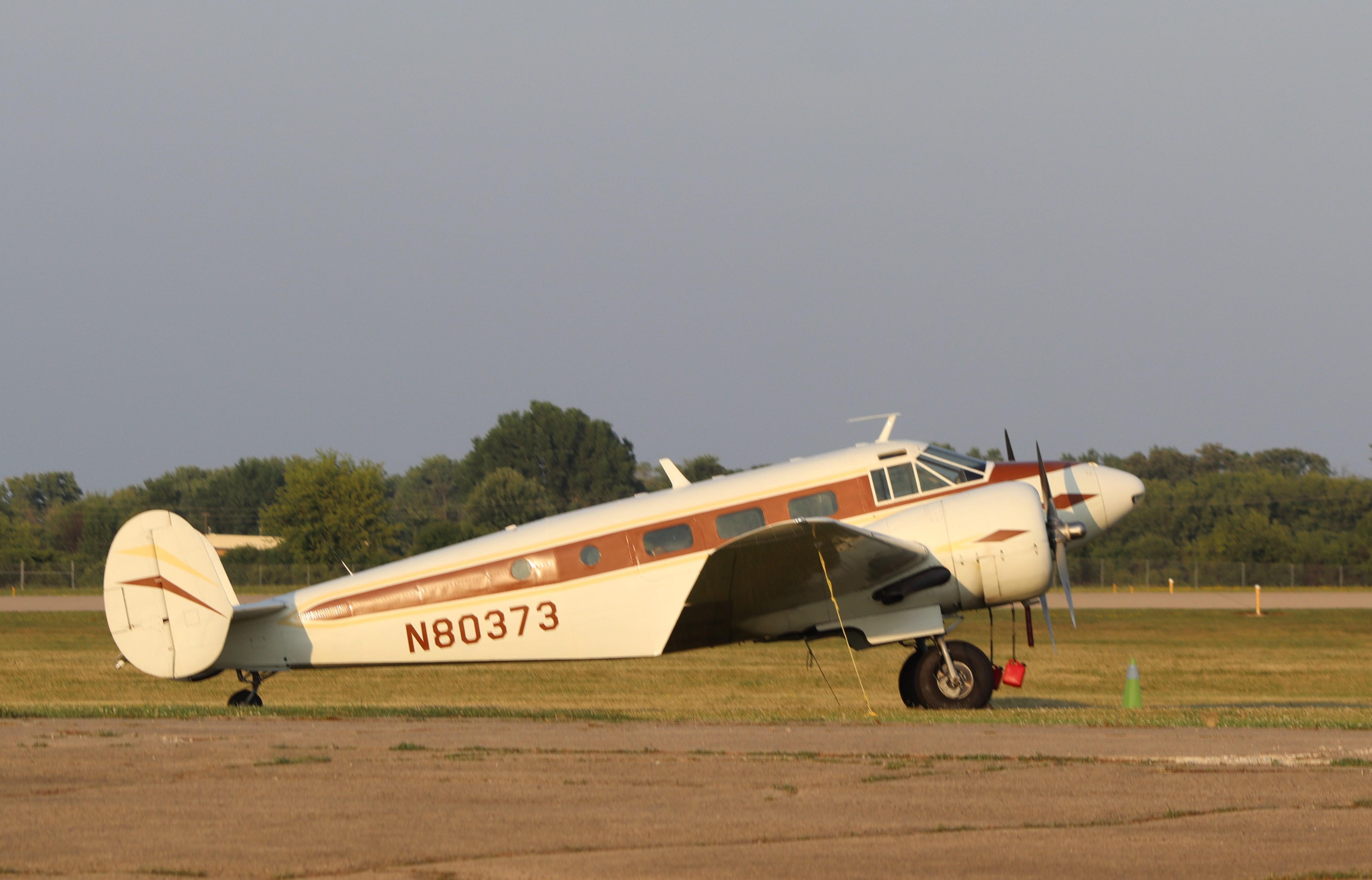 Aircraft N80373, Beech D18S, at KOSH, photo by MarkPasqualino