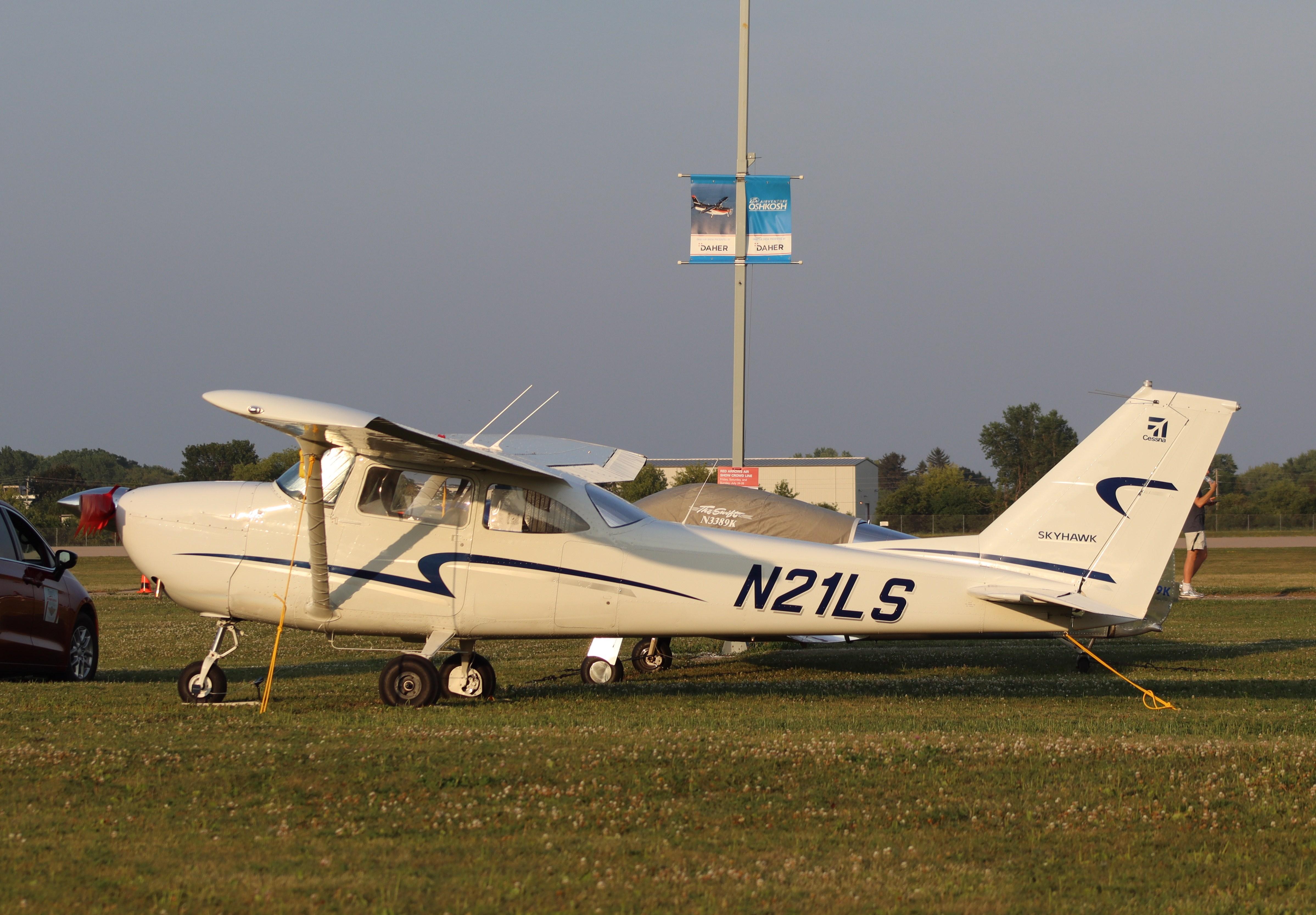 Aircraft N21LS, Cessna 172E, at KOSH, photo by MarkPasqualino