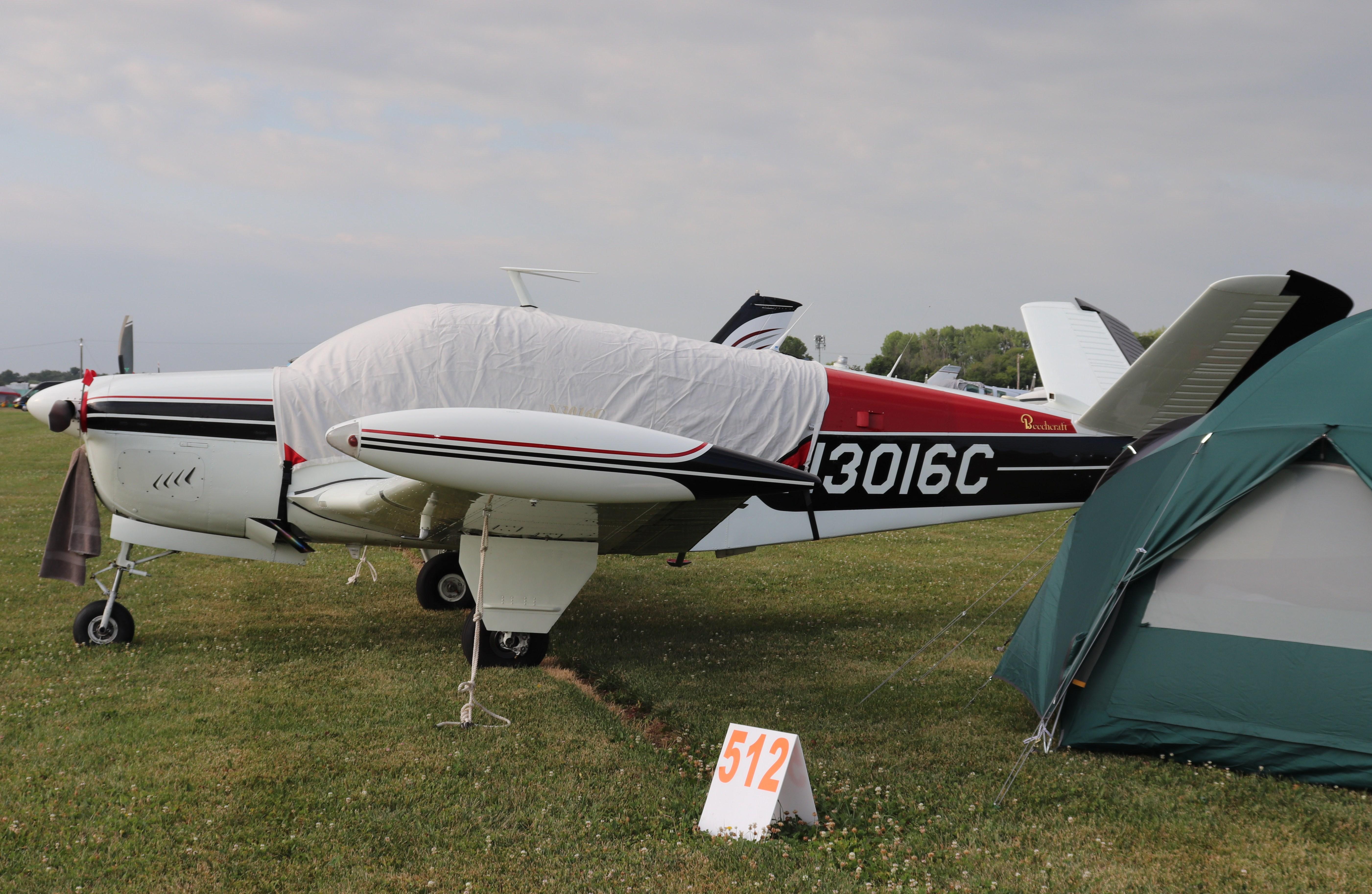 Aircraft N3016C, Beech J35, at KOSH, photo by MarkPasqualino