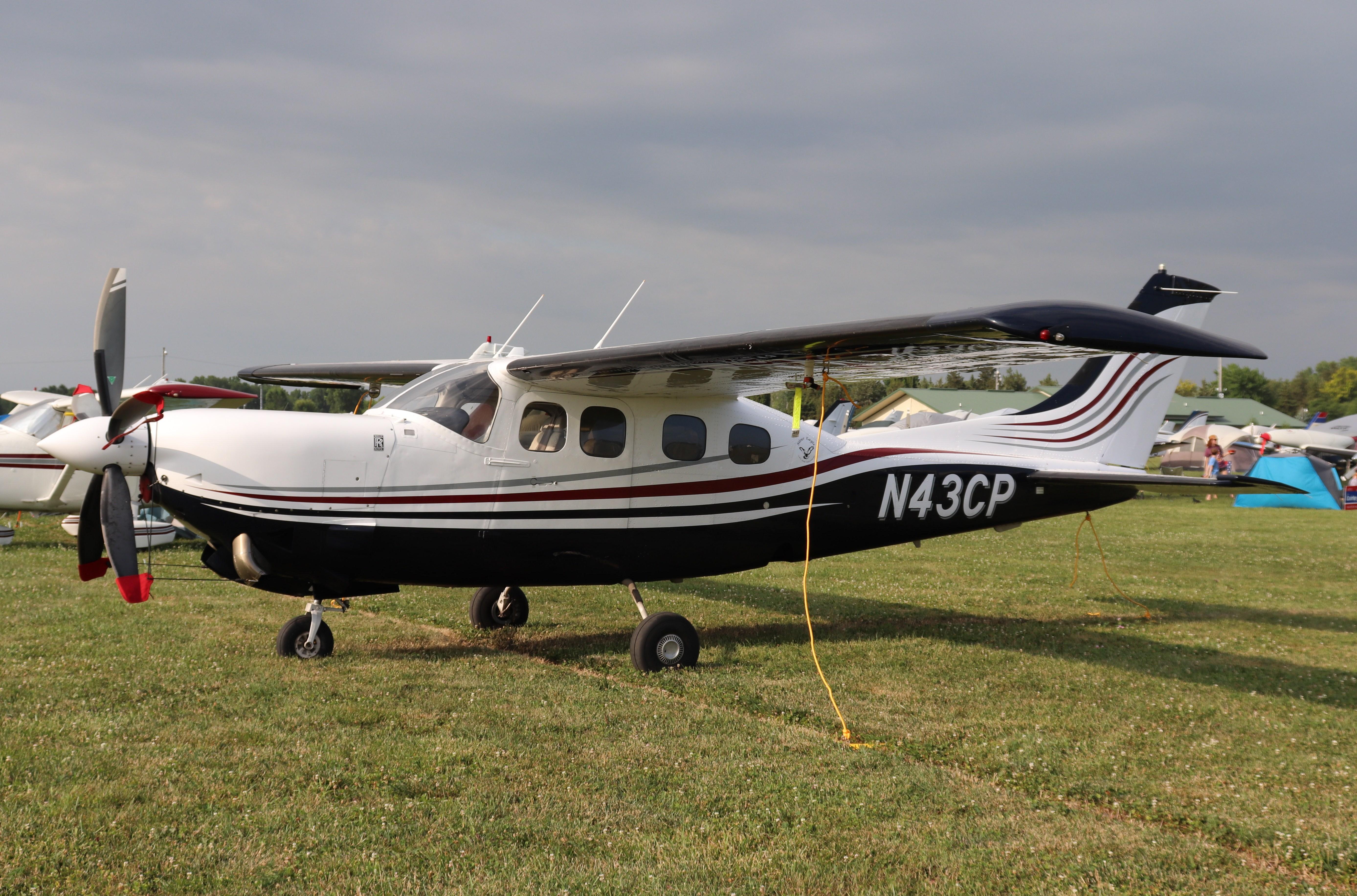 Aircraft N43CP, Cessna P210N, at KOSH, photo by MarkPasqualino