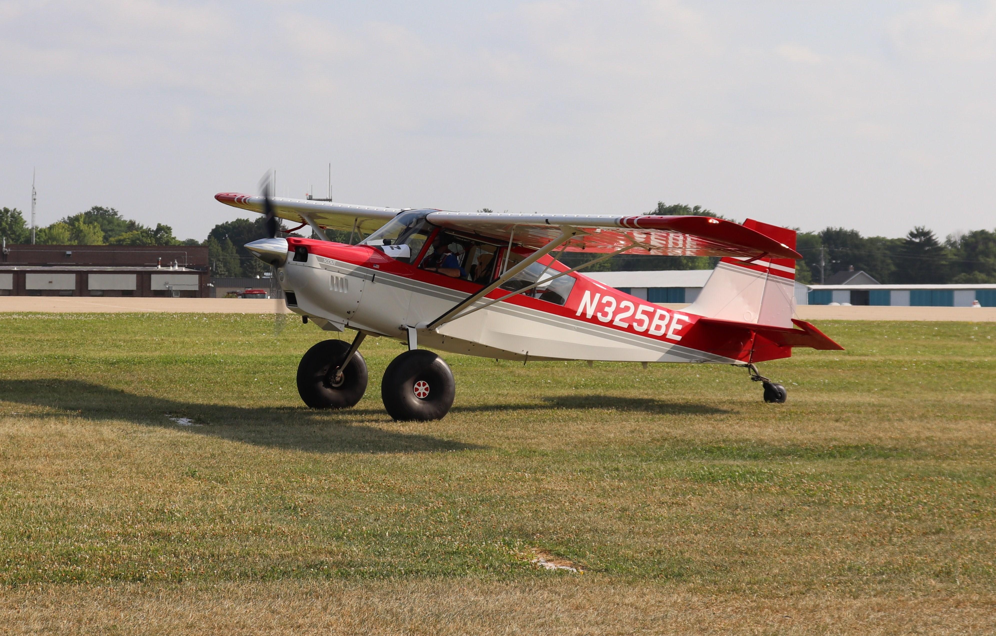 Aircraft N325BE, American Champion 8GCBC, at KOSH, photo by MarkPasqualino