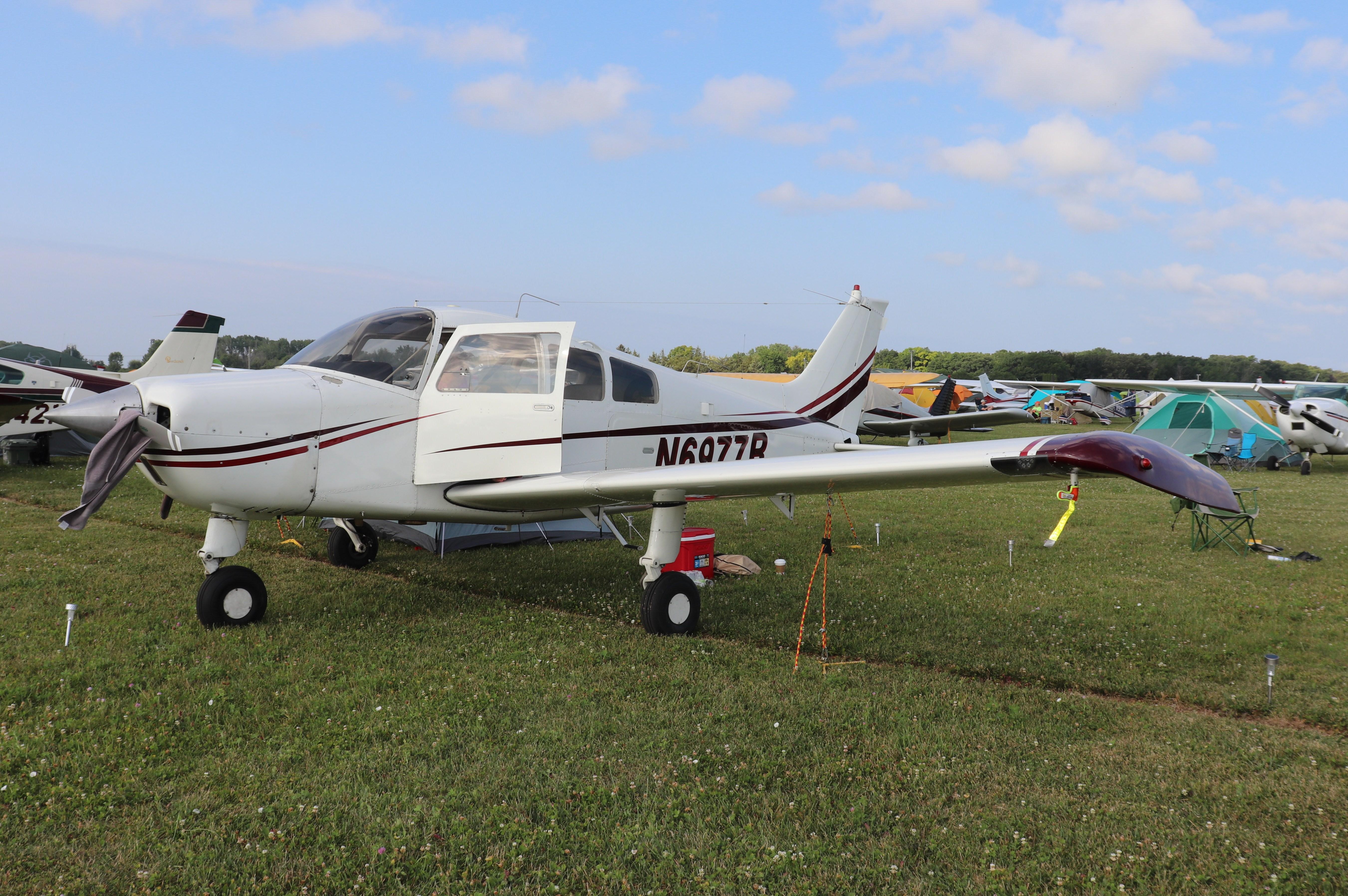 Aircraft N6977R, Beech C23, at KOSH, photo by MarkPasqualino