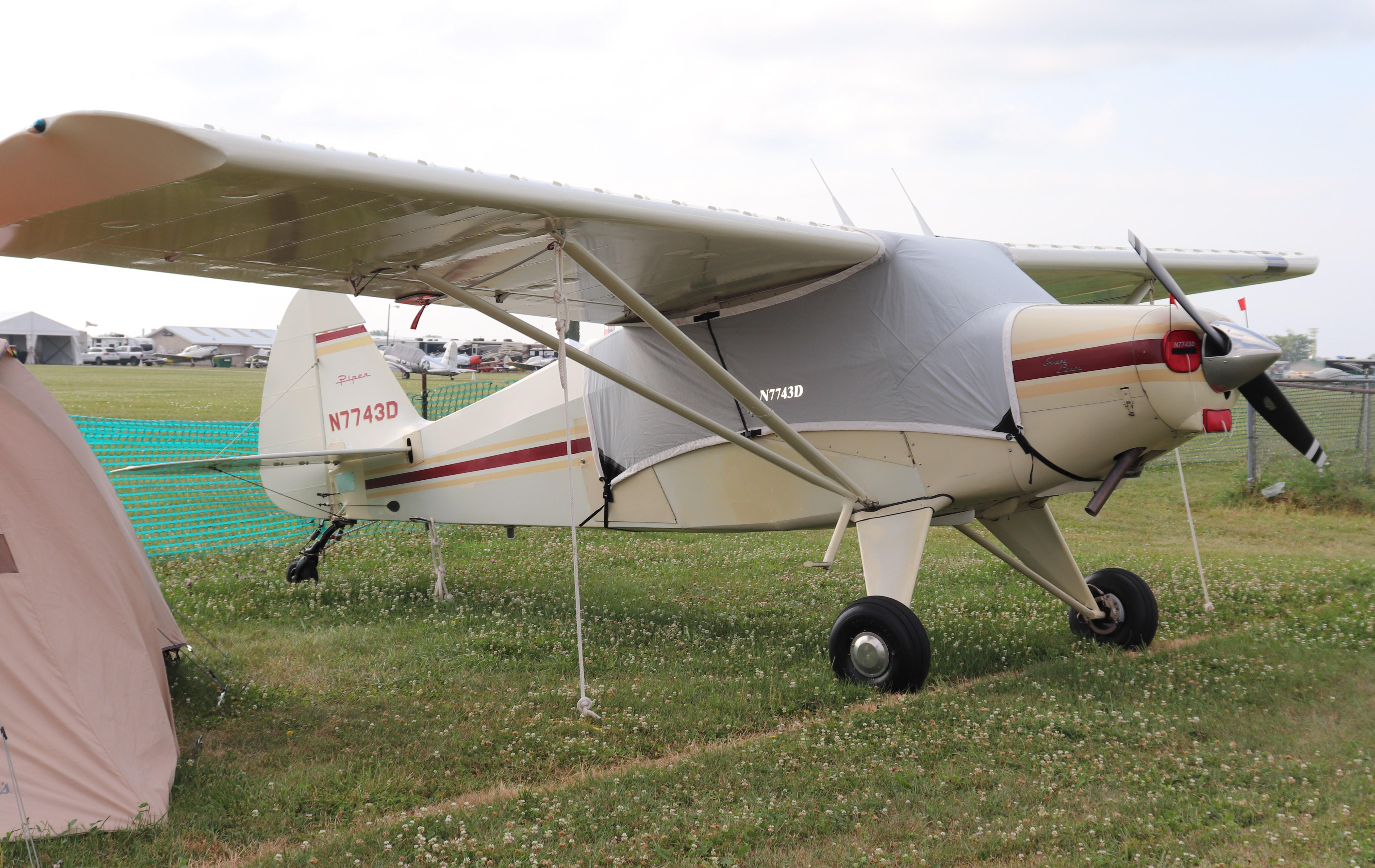 Aircraft N7743D, Piper PA-22-150, at KOSH, photo by MarkPasqualino