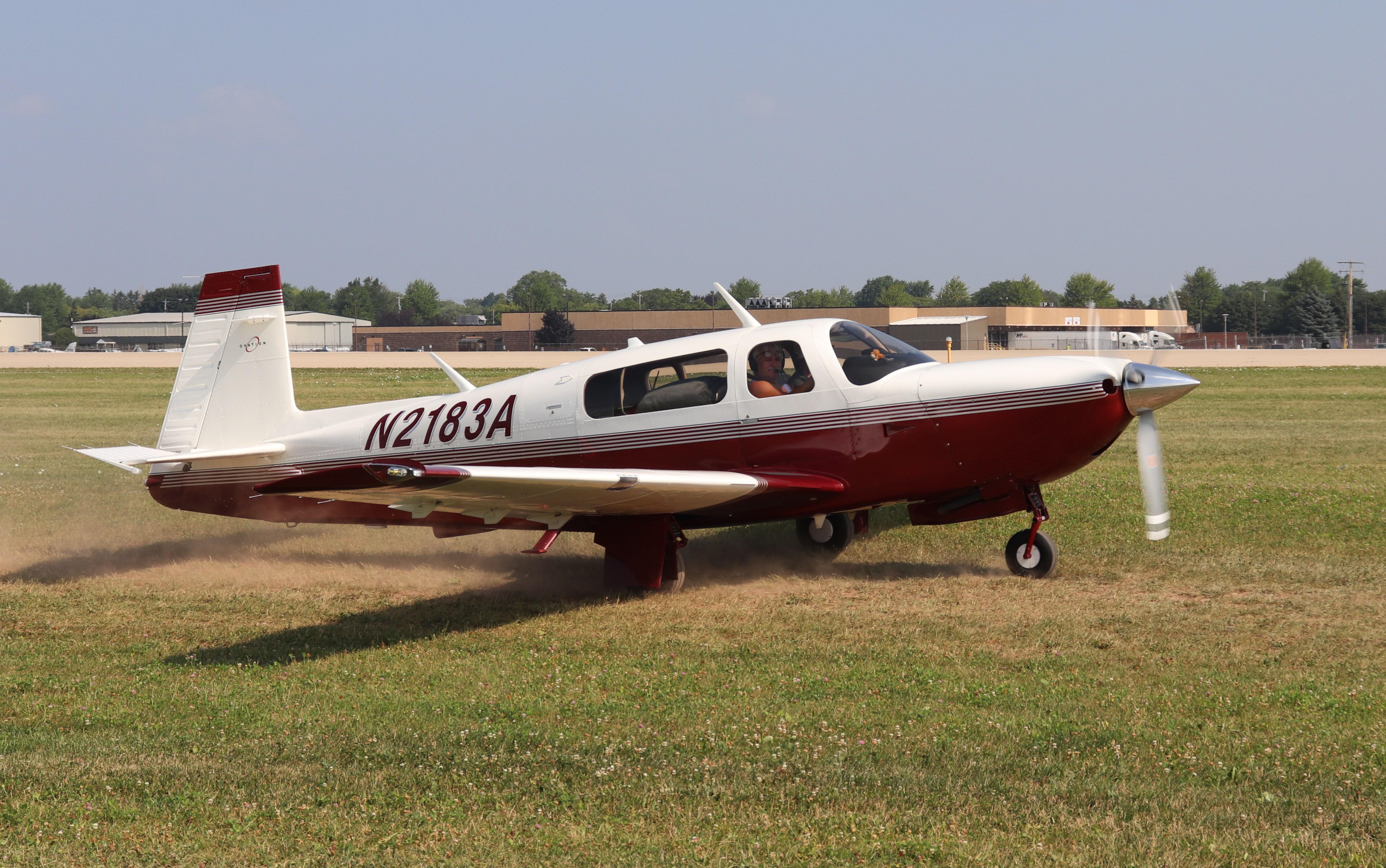 Aircraft N2183A, Mooney M20R, at KOSH, photo by MarkPasqualino