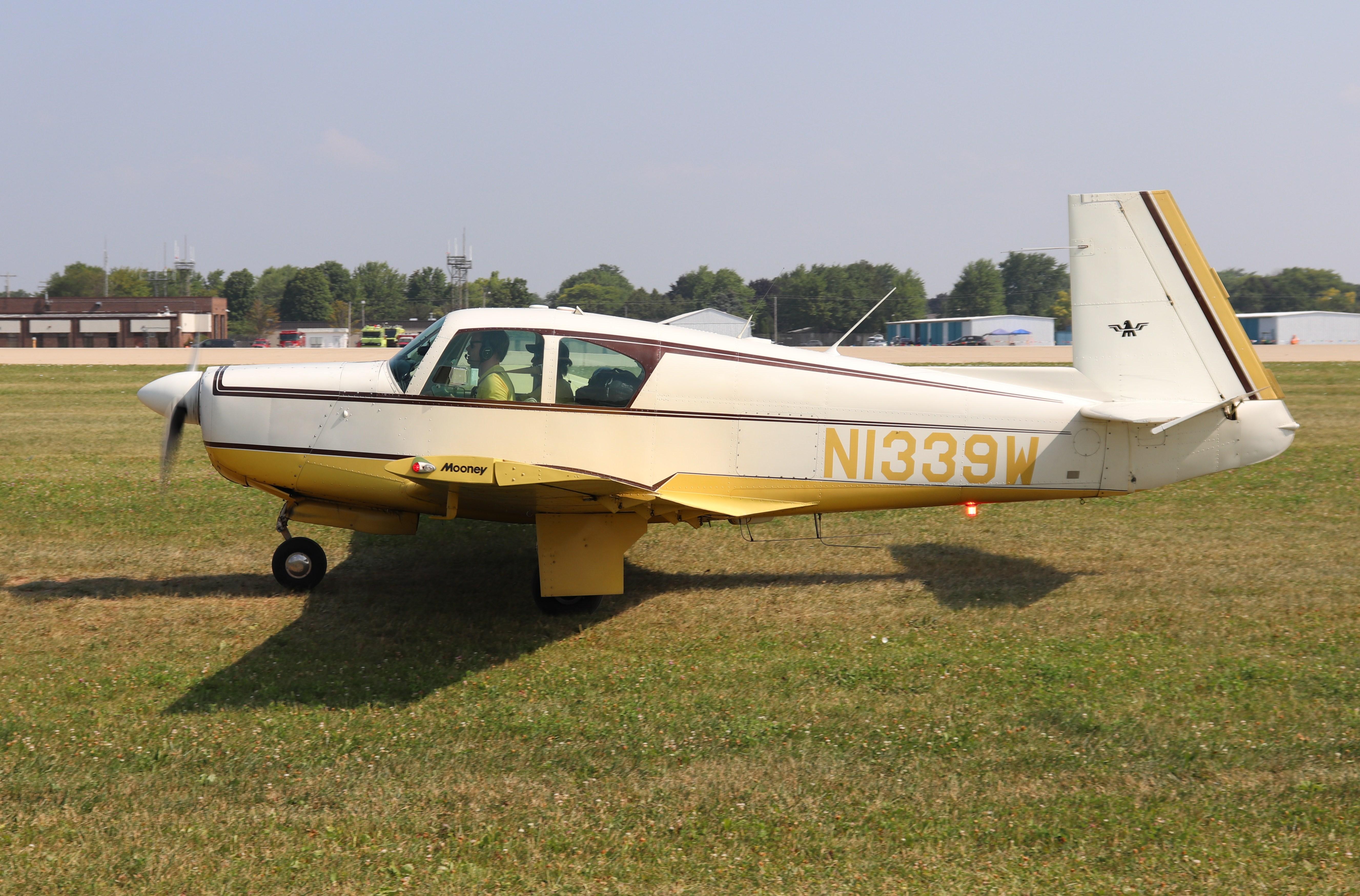 Aircraft N1339W, Mooney M20E, at KOSH, photo by MarkPasqualino